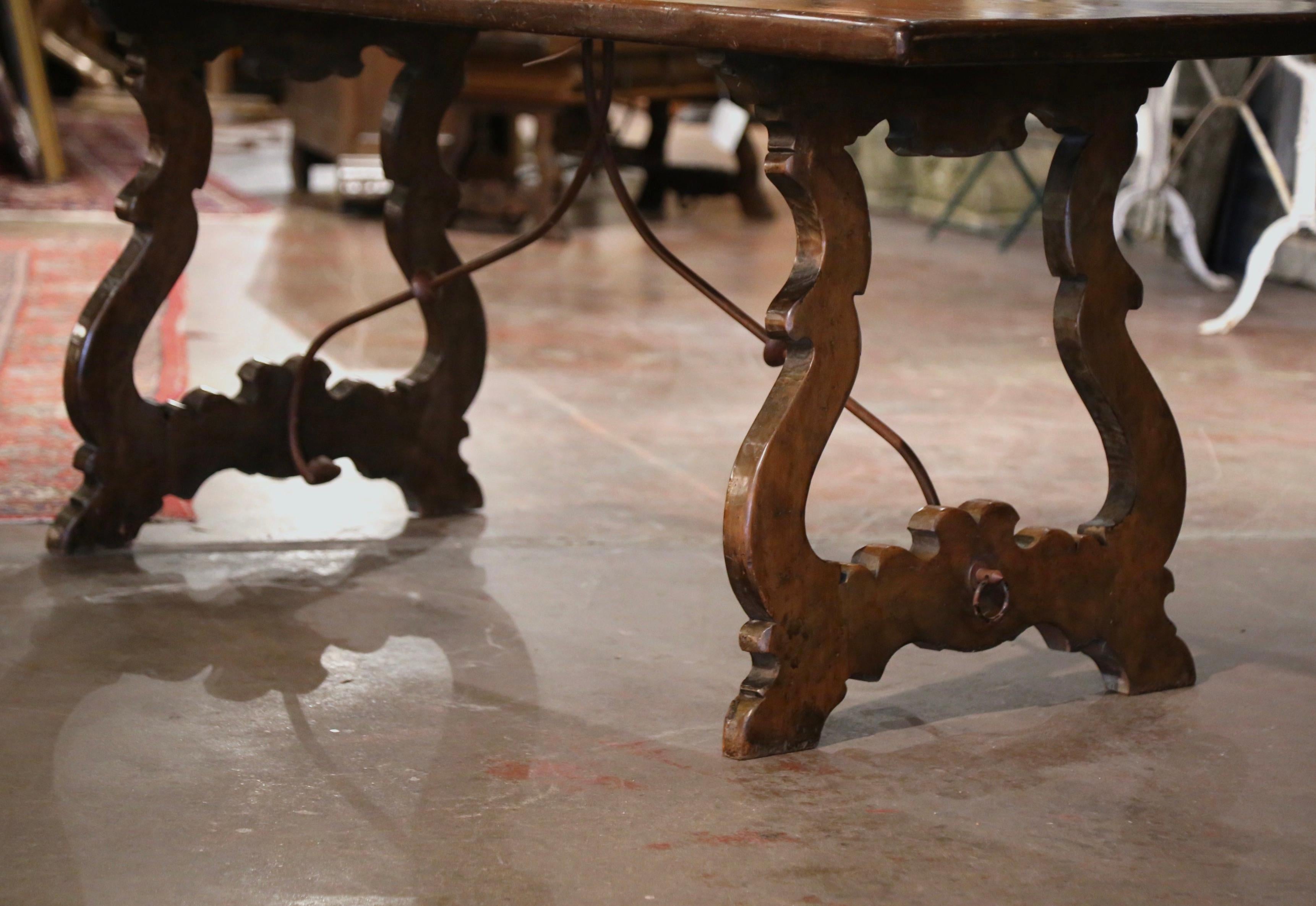 19th Century Spanish Baroque Iron Stretcher Carved Walnut Dining Trestle Table In Excellent Condition In Dallas, TX