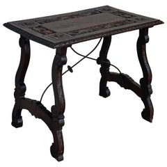 19th Century Spanish Baroque Side Table with Carved Top 
Legs 
Iron Stretchers