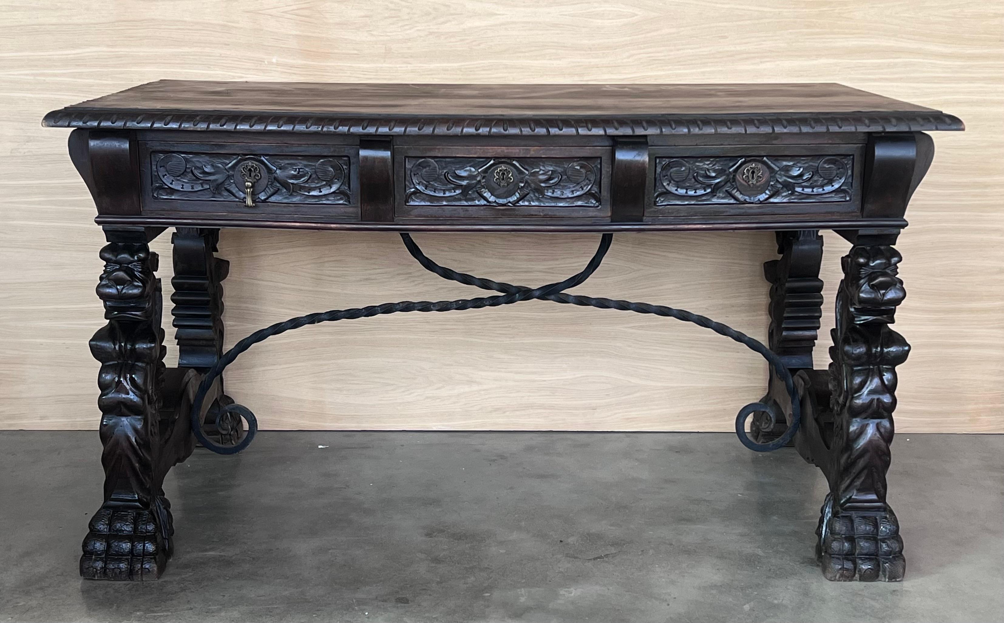 Handsome oak library piece that can be used as a desk or Work table. Made of oak having carved gadrooned edges.  Carved on all sides and five drawers ox bow ends, 19th century.
Workable locks and keys.

Height from the floor to the bottom drawer