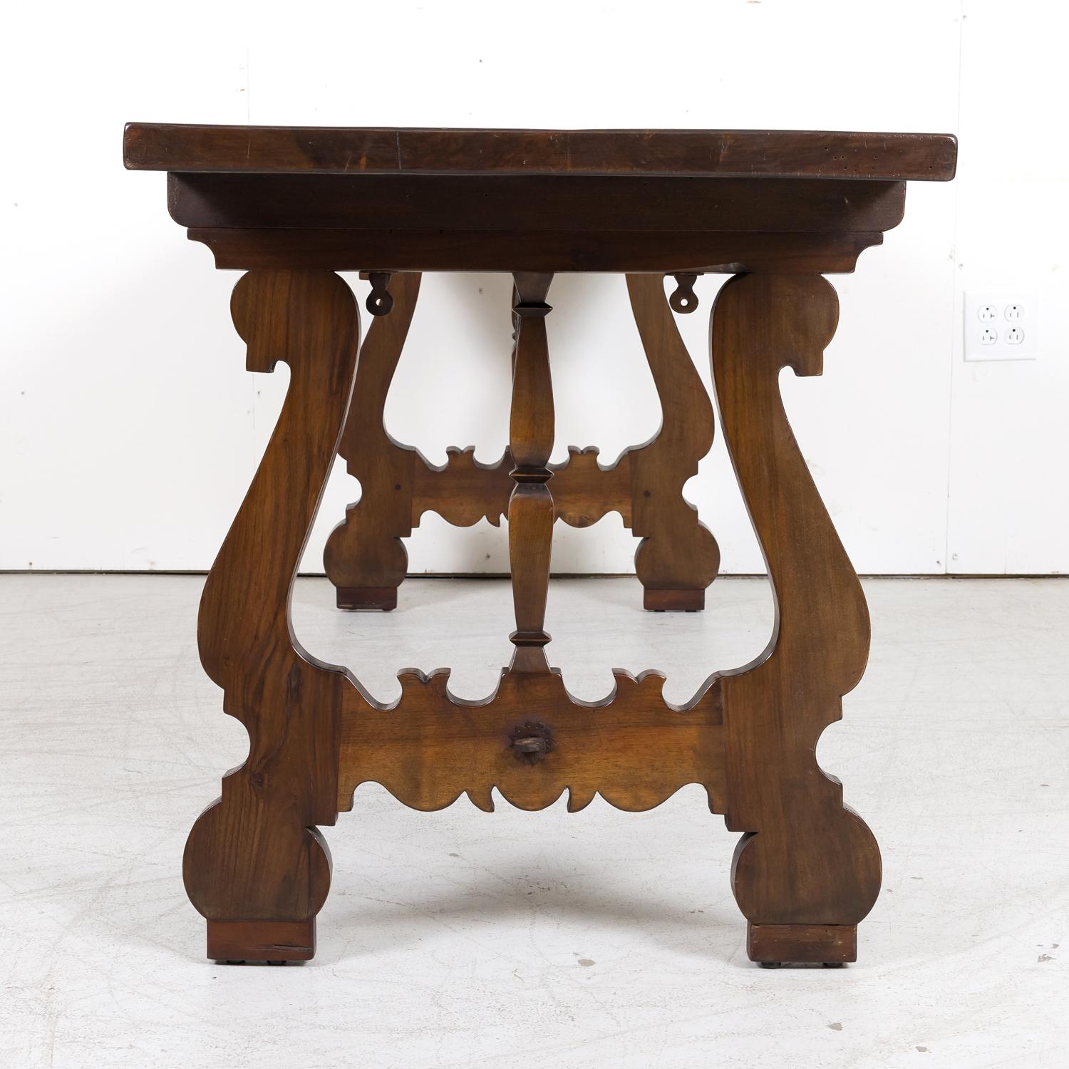 19th Century Spanish Baroque Style Walnut Trestle Dining Table with Iron Stretch 8
