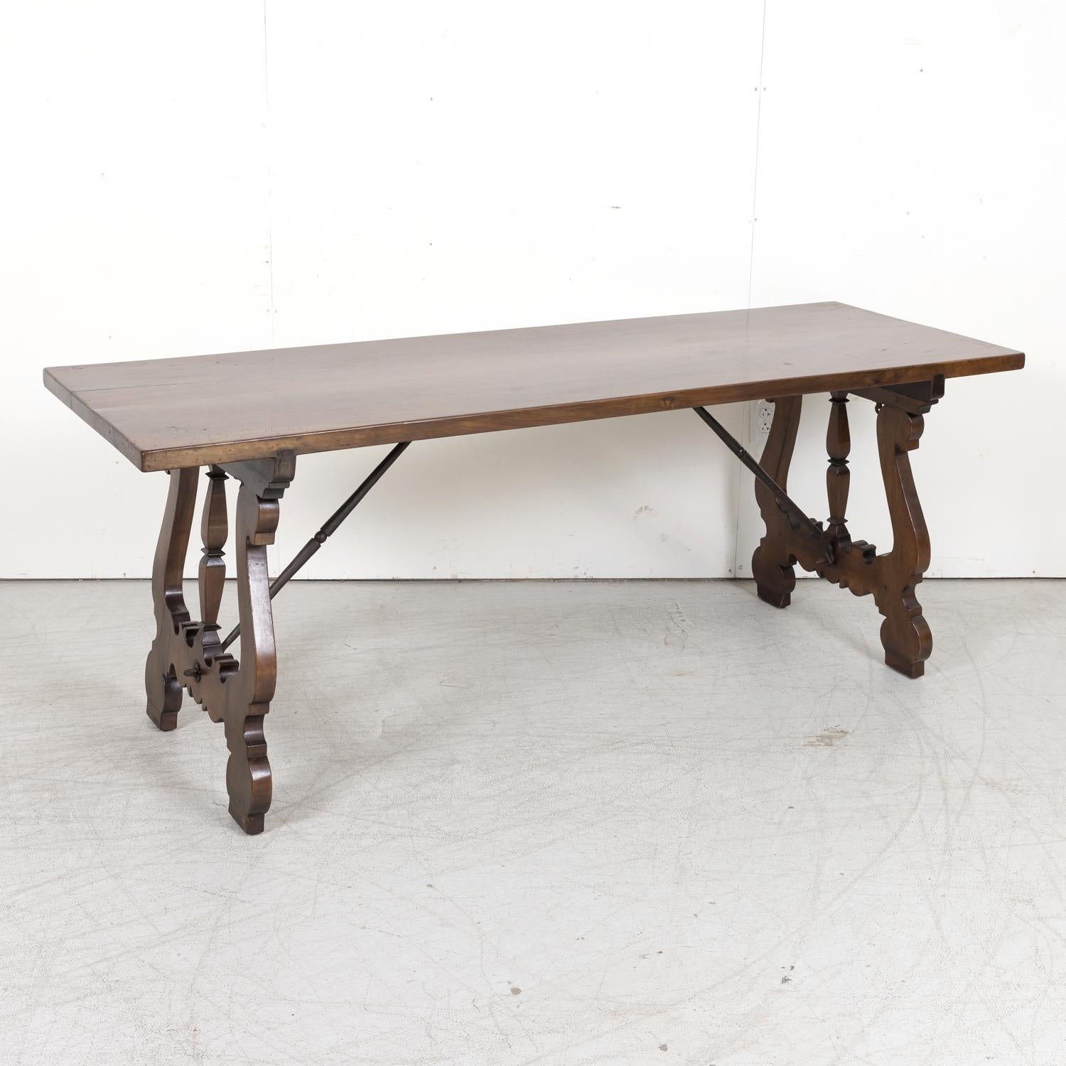 19th Century Spanish Baroque Style Walnut Trestle Dining Table with Iron Stretch In Good Condition In Birmingham, AL