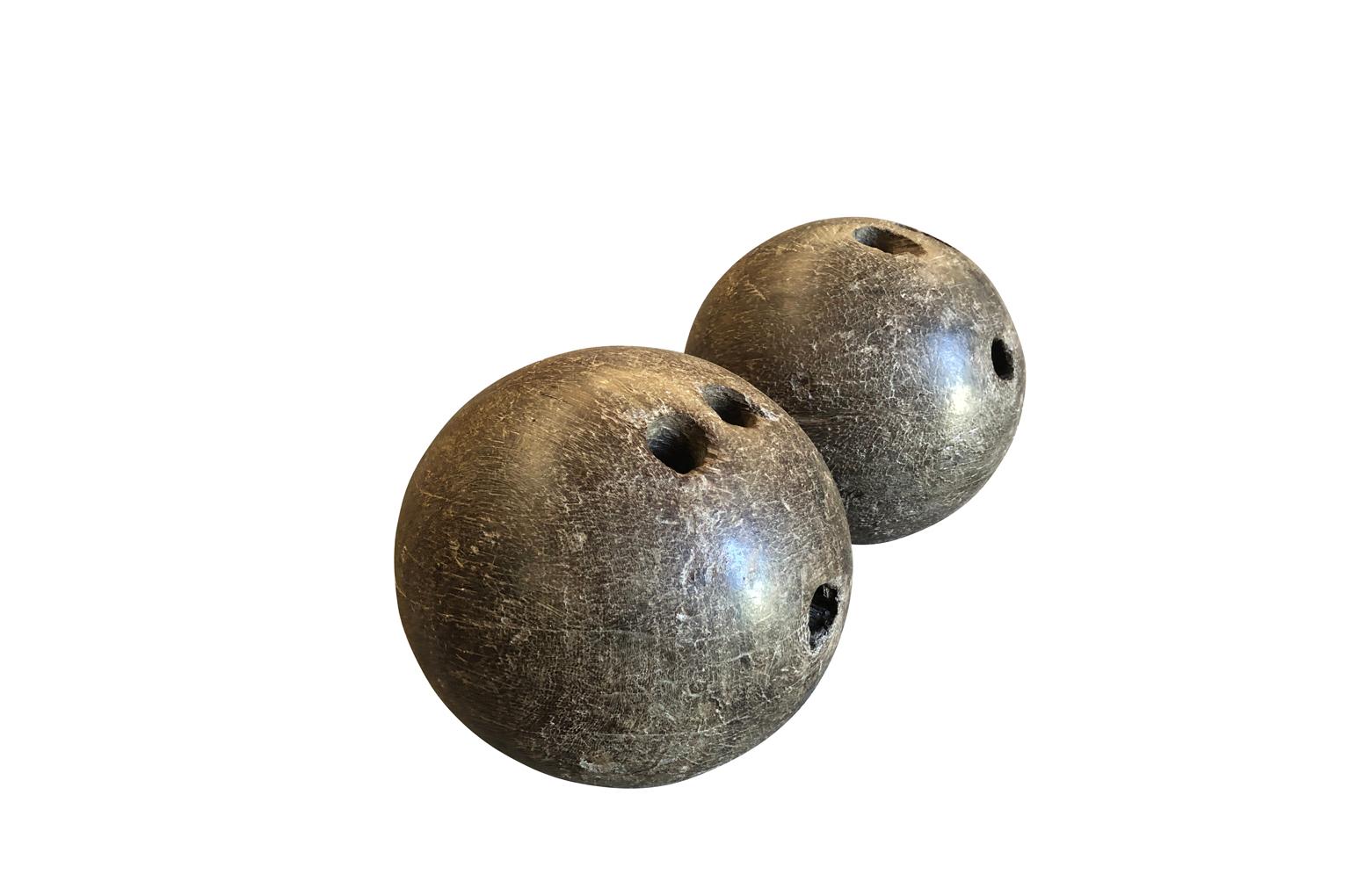 A terrific pair of mid-19th century carved wood bowling balls. A great accessory for any tabletop or bookcase.