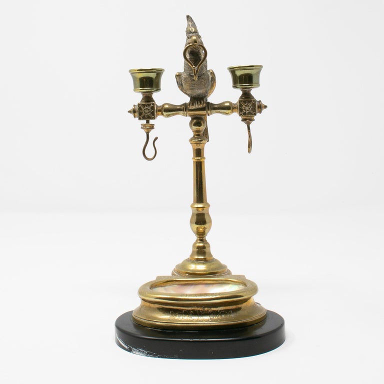 19th century Spanish bronze and mother of pearl watch stand topped with a parrot.