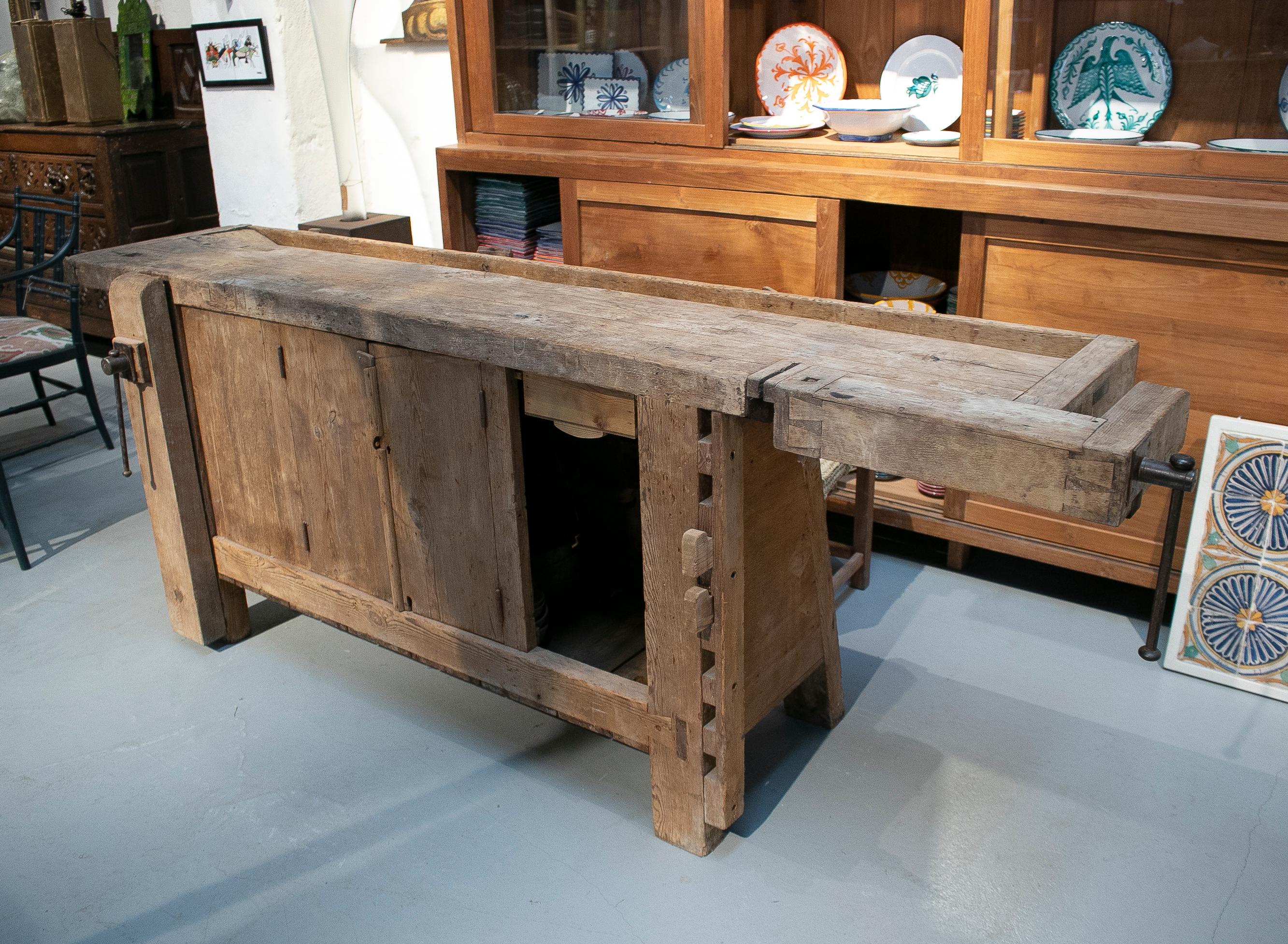 Antique 19th century Spanish carpenters workbench table with iron hardware.