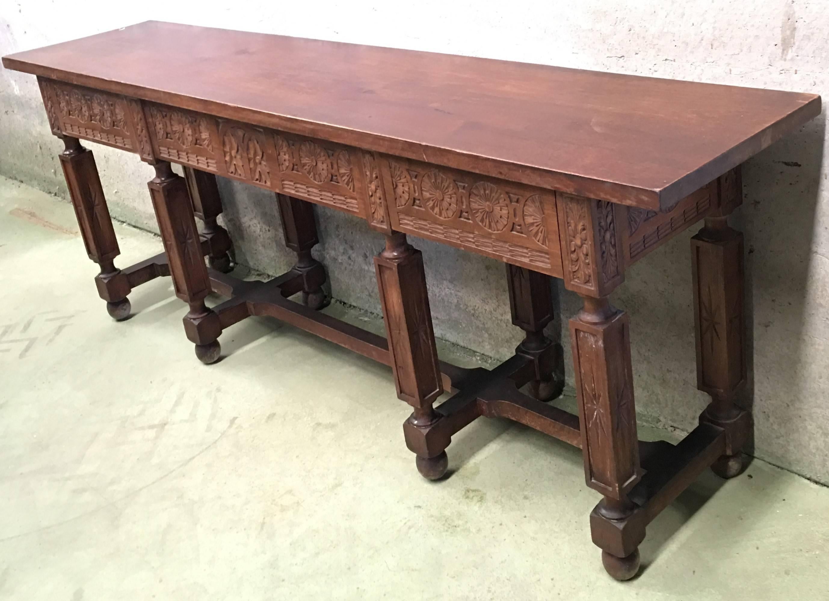 19th century Spanish carved walnut bench or low table with two drawers.
