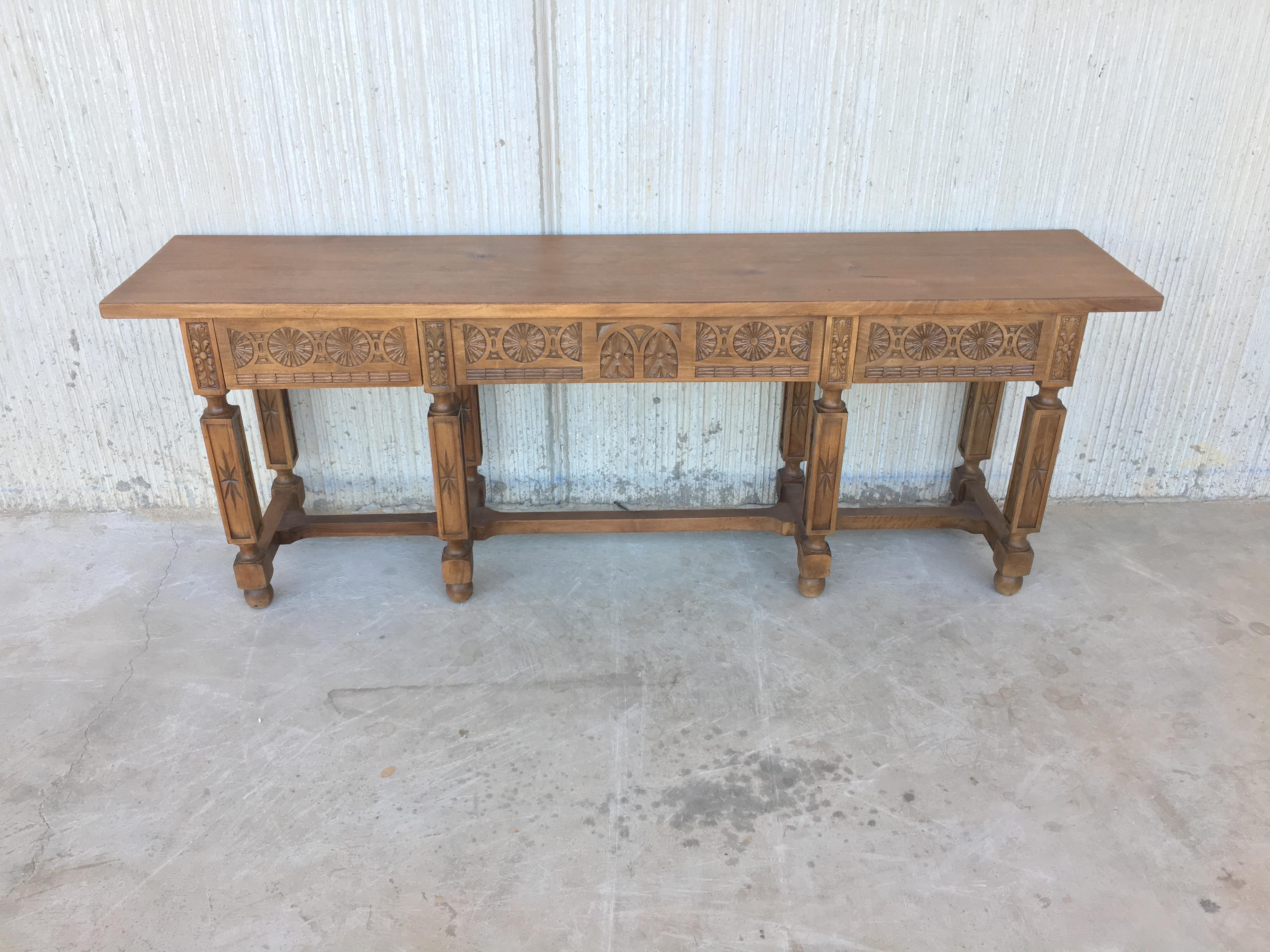 19th century Spanish carved walnut bench or low table with two drawers.