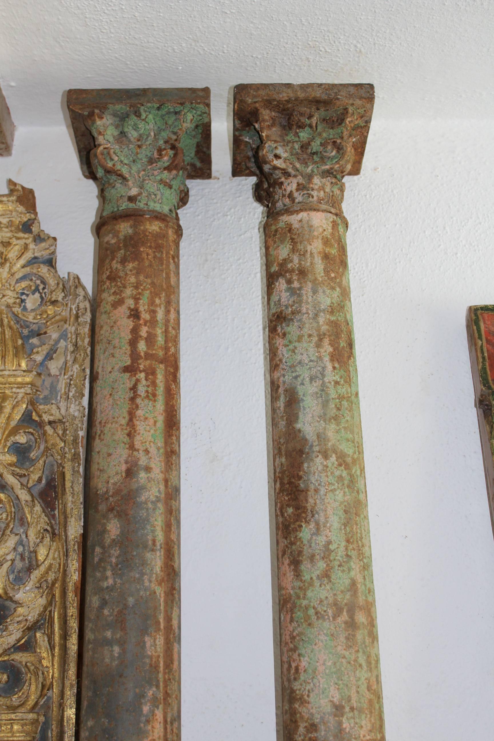 Antique 19th century Spanish cast iron Corinthian columns with their original green color.