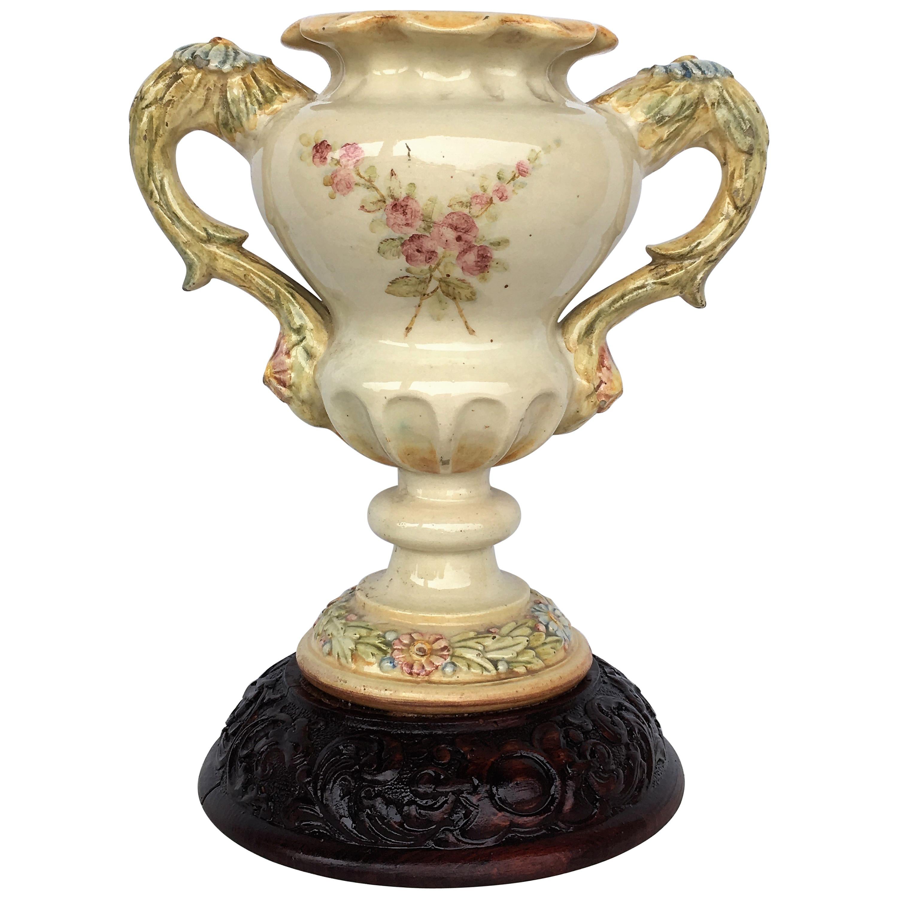 19th Century Spanish Ceramic Floral Urn with Two Handles and Carved Wood Base For Sale