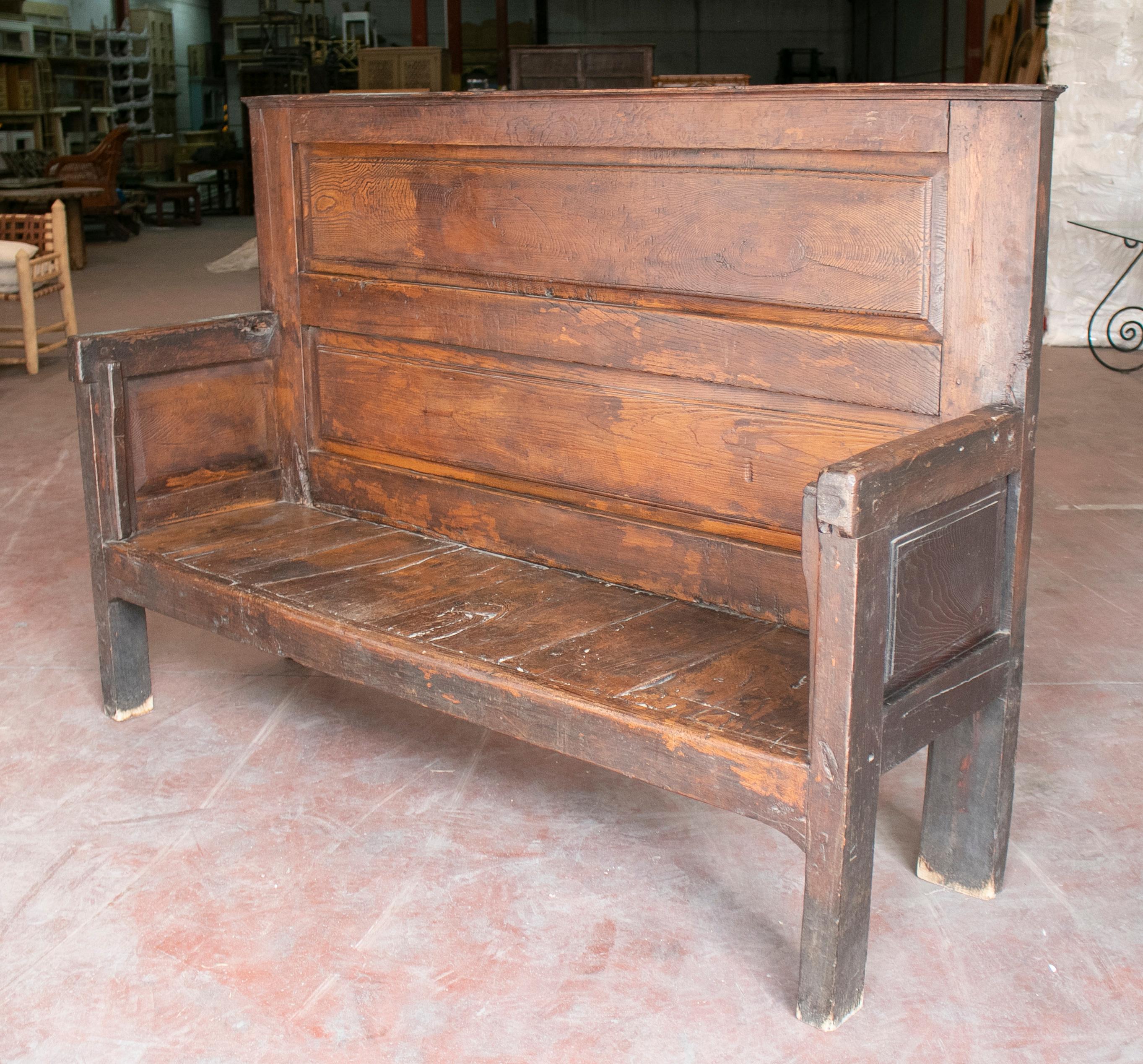 Antique 19th century northern Spain chestnut rustic seating bench.