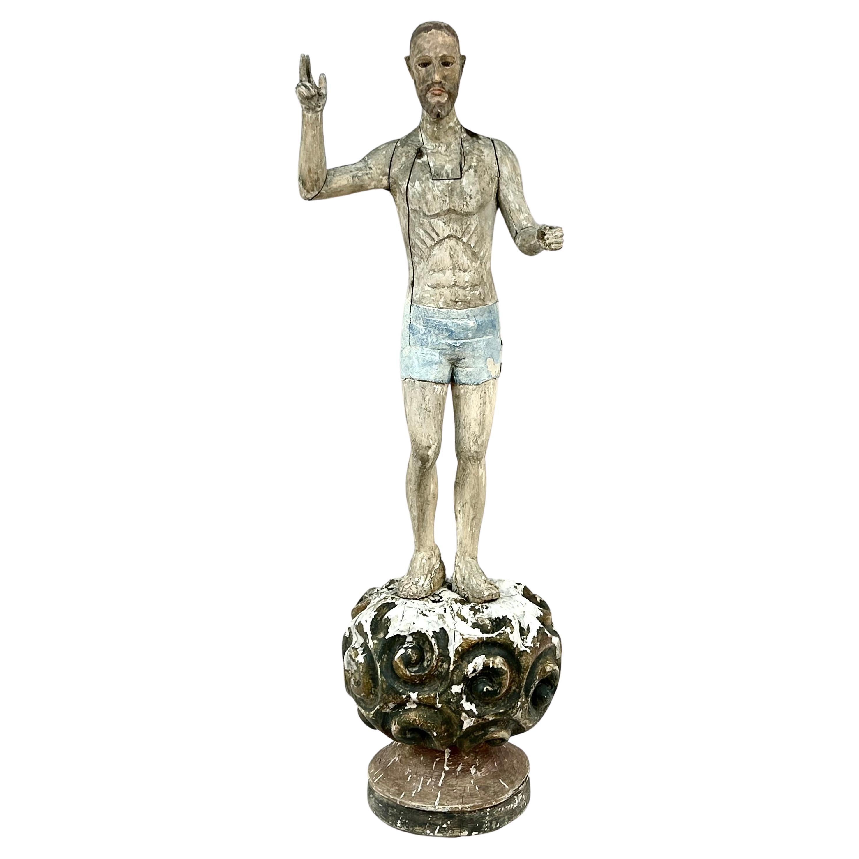 Religiöse Figur aus der spanischen Kolonialzeit des 19. Jahrhunderts  In geschnitztem und polychromiertem Holz