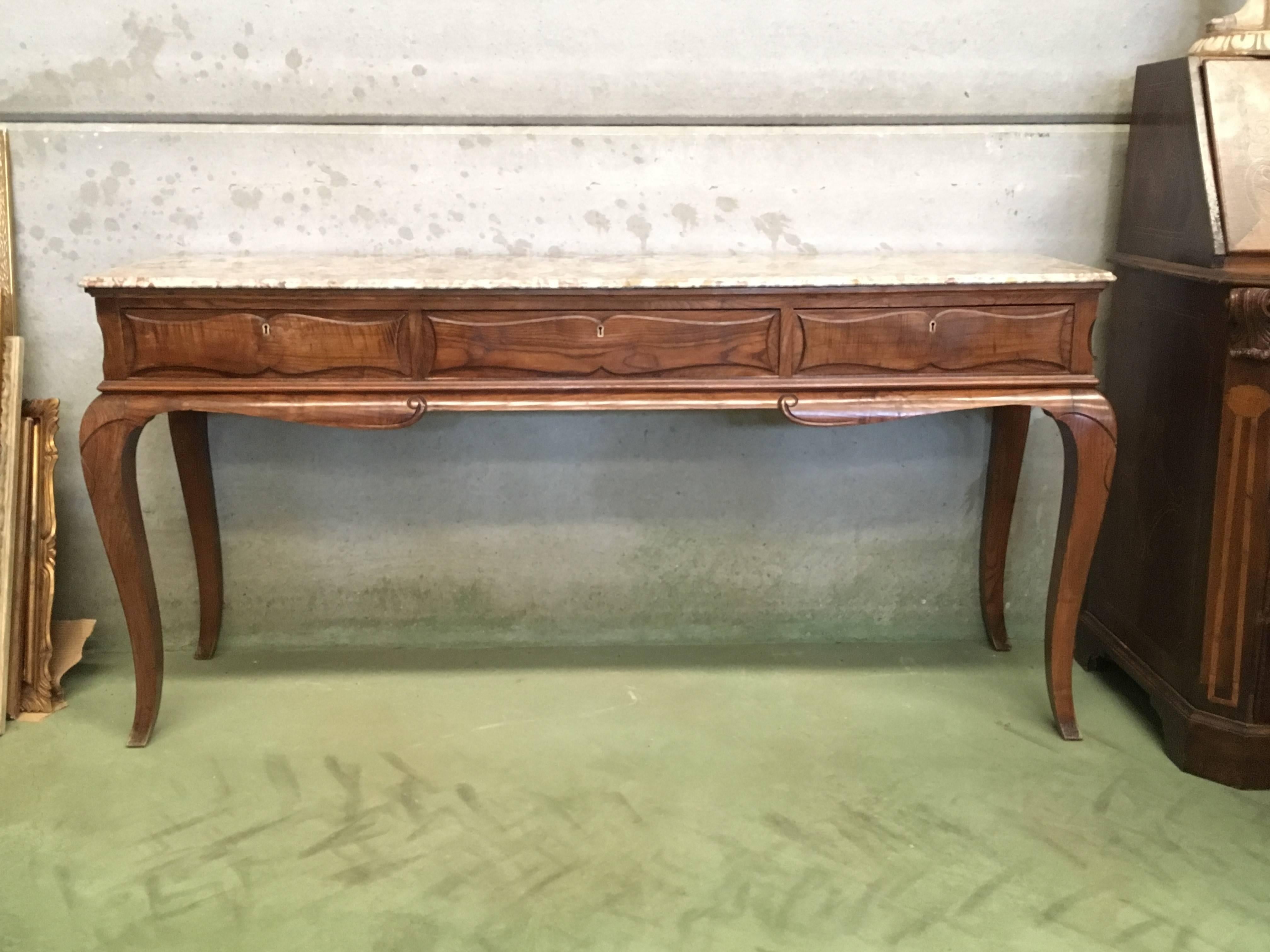 19th century Spanish Colonial three drawers console table with locks and marble top.