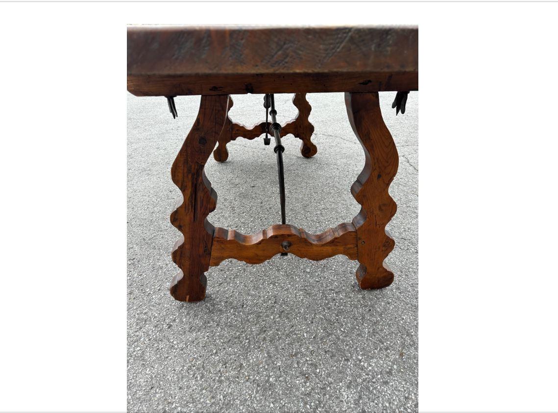 The only thing more difficult than sourcing the perfect antique dining table, is finding seating to go along with it! Worry no more with this 19th Century Spanish table and removable benches. Not only does this unique piece create an upscale curated