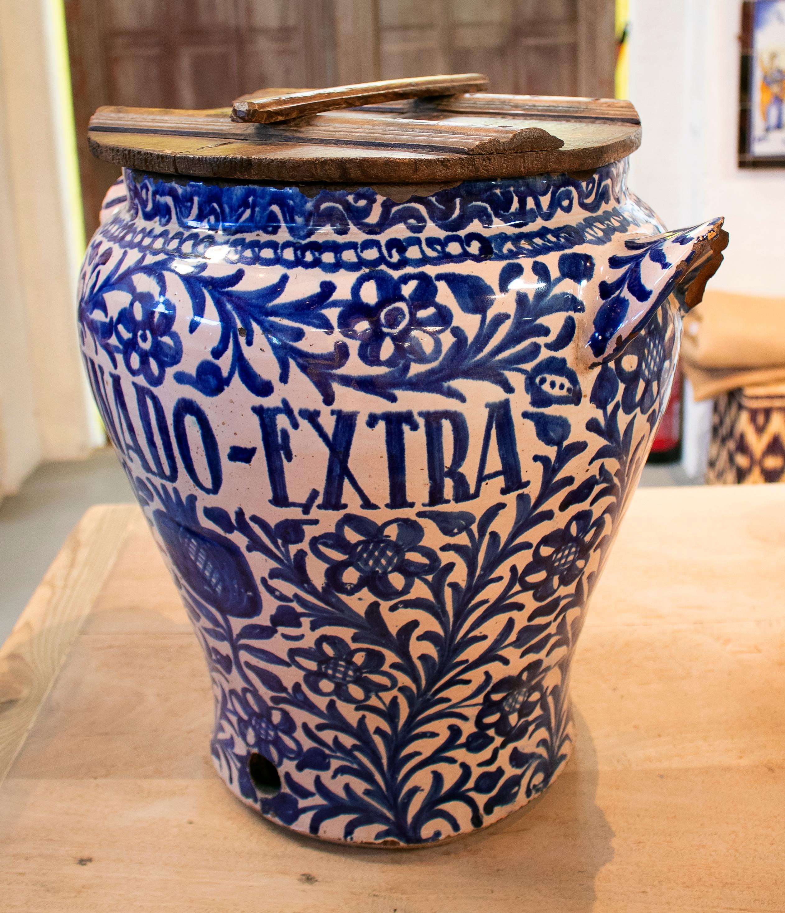 19th century Spanish Fajalouza glazed pottery vase decorated with cobalt blue and reading 