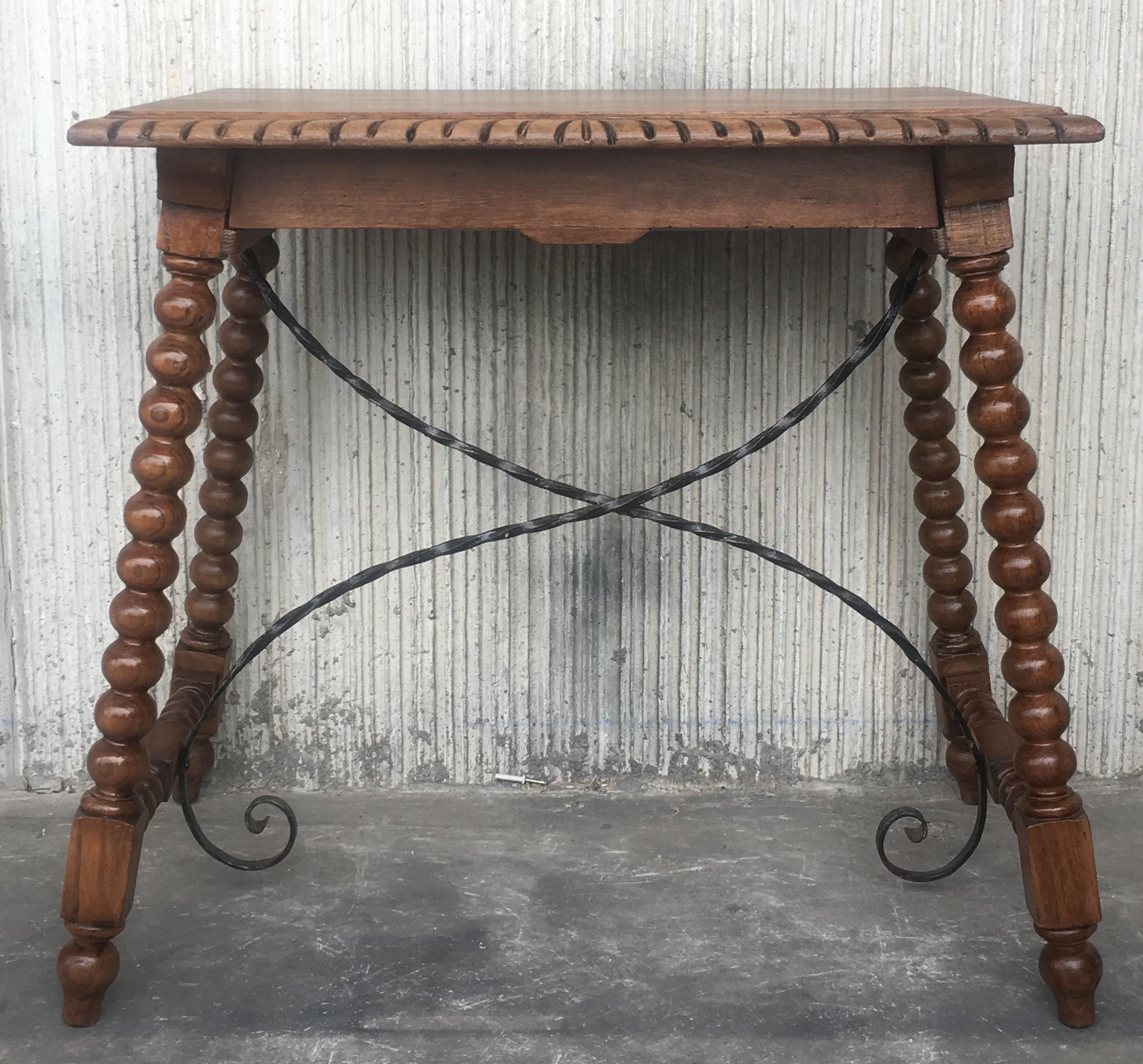 Spanish Colonial 19th Century Spanish Farm Table with Iron Stretchers, Hand Carved Top and Drawer For Sale