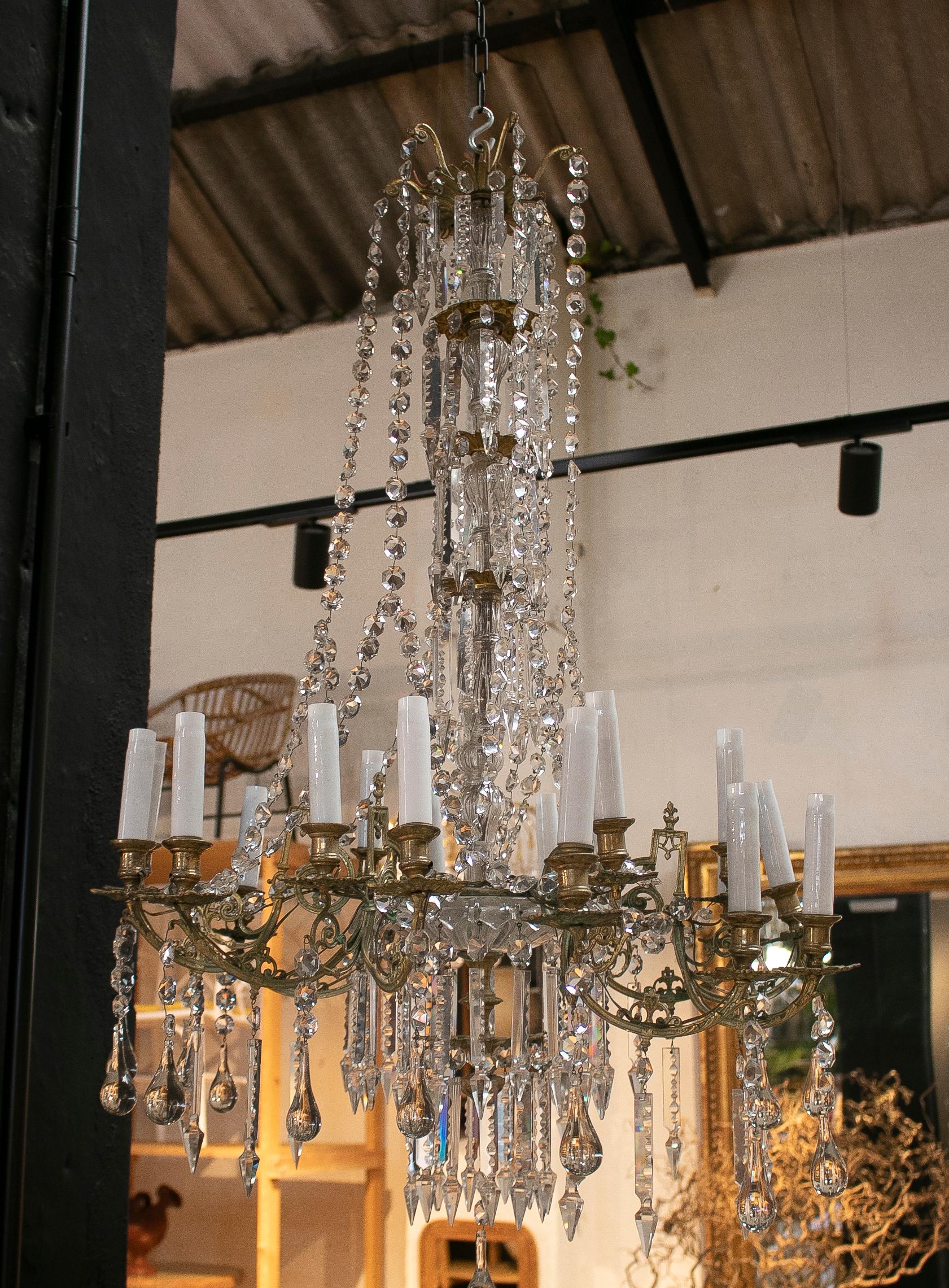 19th century Spanish fire gilt bronze chandelier with crystal decorations hanging ceiling lamp.