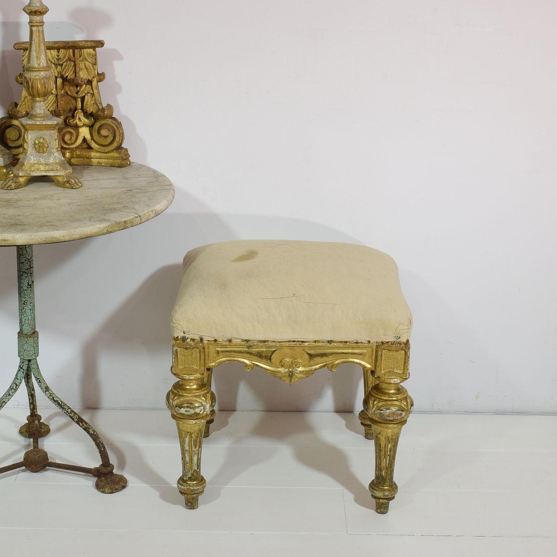 Beautiful gilded stool or tabouret.
Spain, circa 1850, weathered, small losses and old repairs.
 