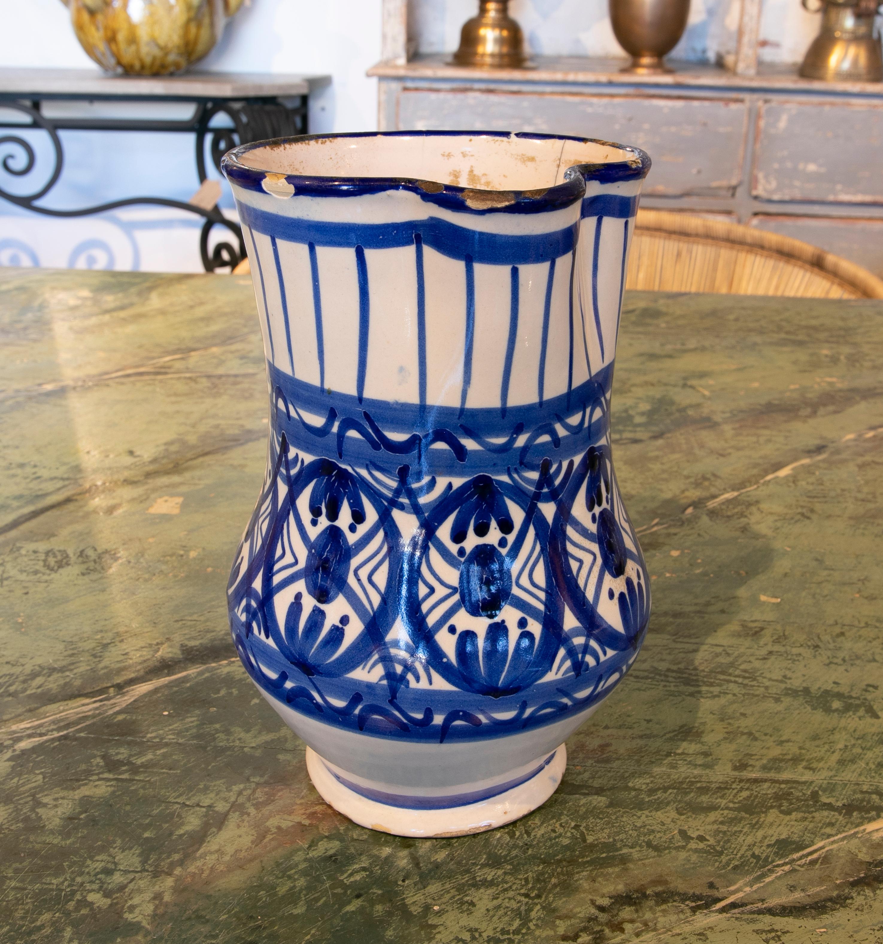19th century Spanish Glazed Ceramic jug with handle in Tones of blue.
