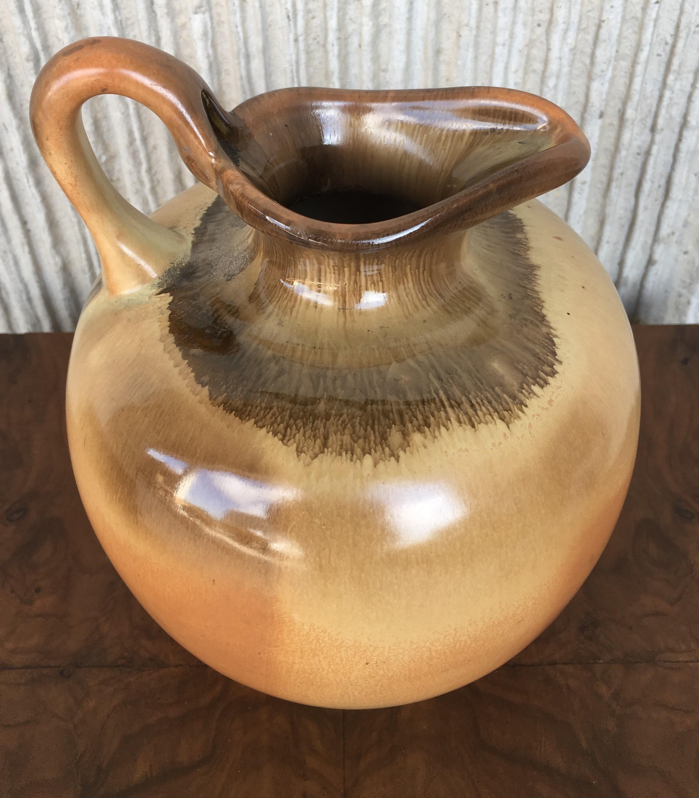 19th century Spanish glazed terracotta jug, pot or pitcher with handle.