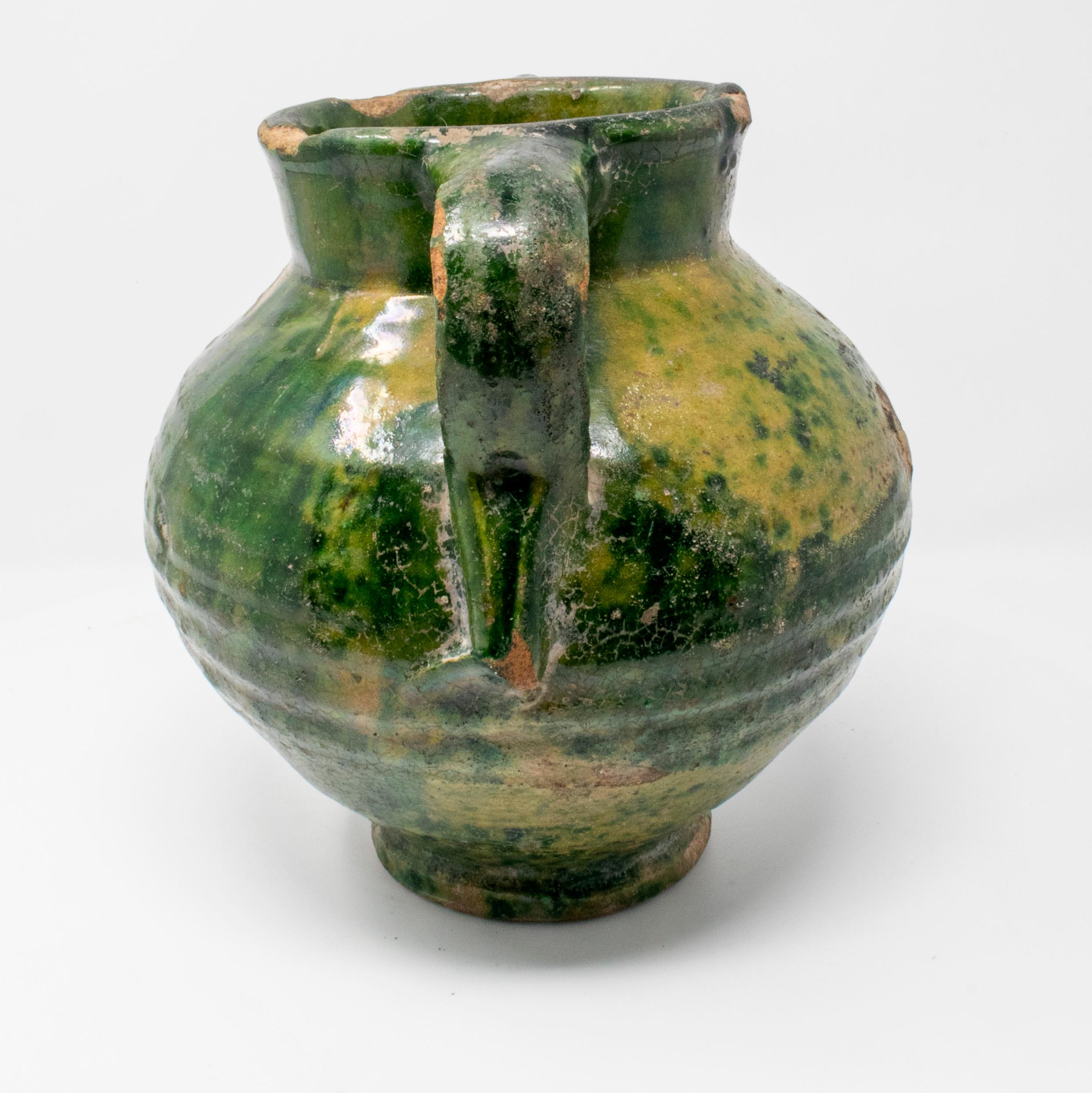 green pottery vase