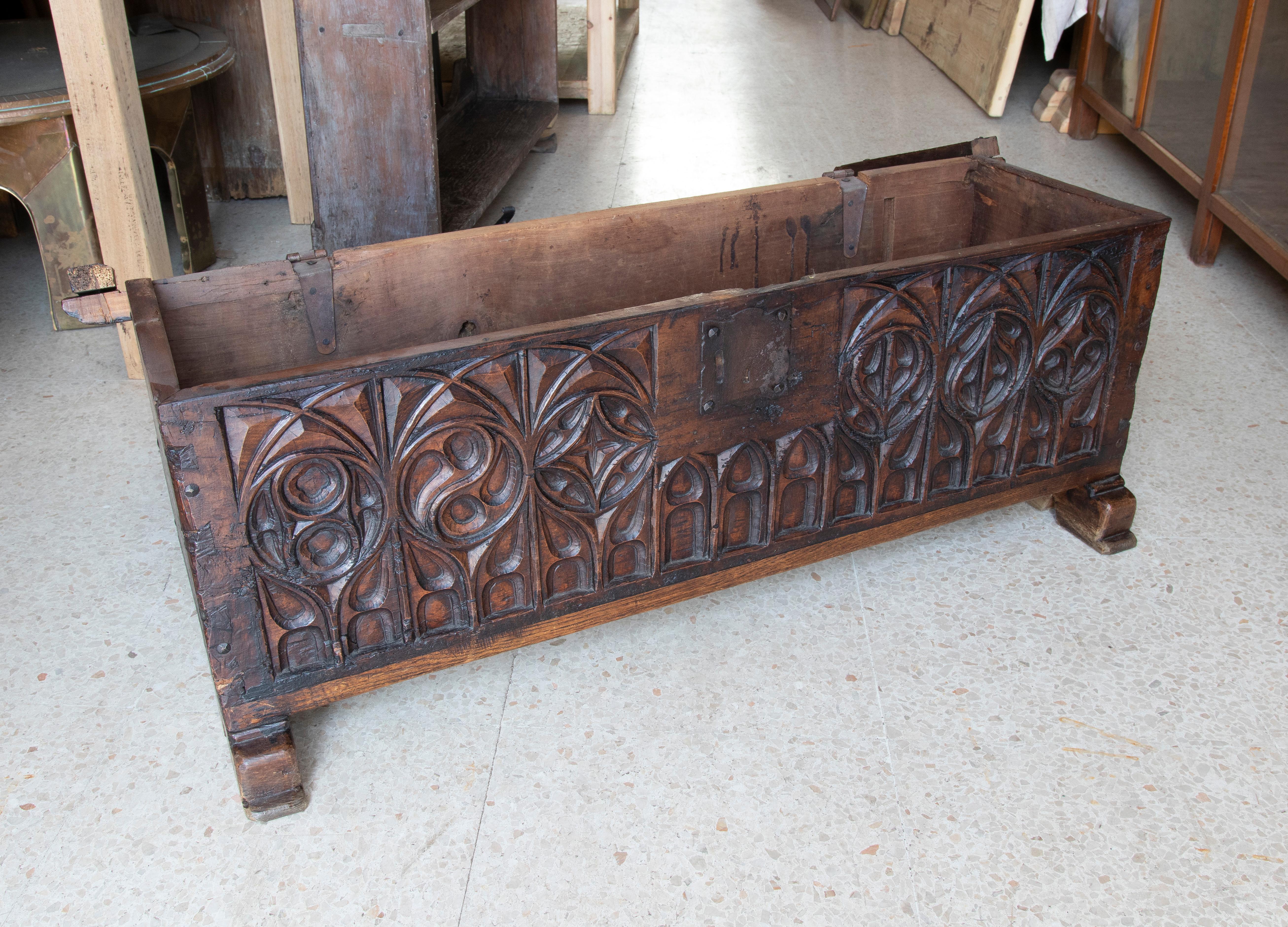 19th century Spanish hand carved wooden chest in Neogothic style.