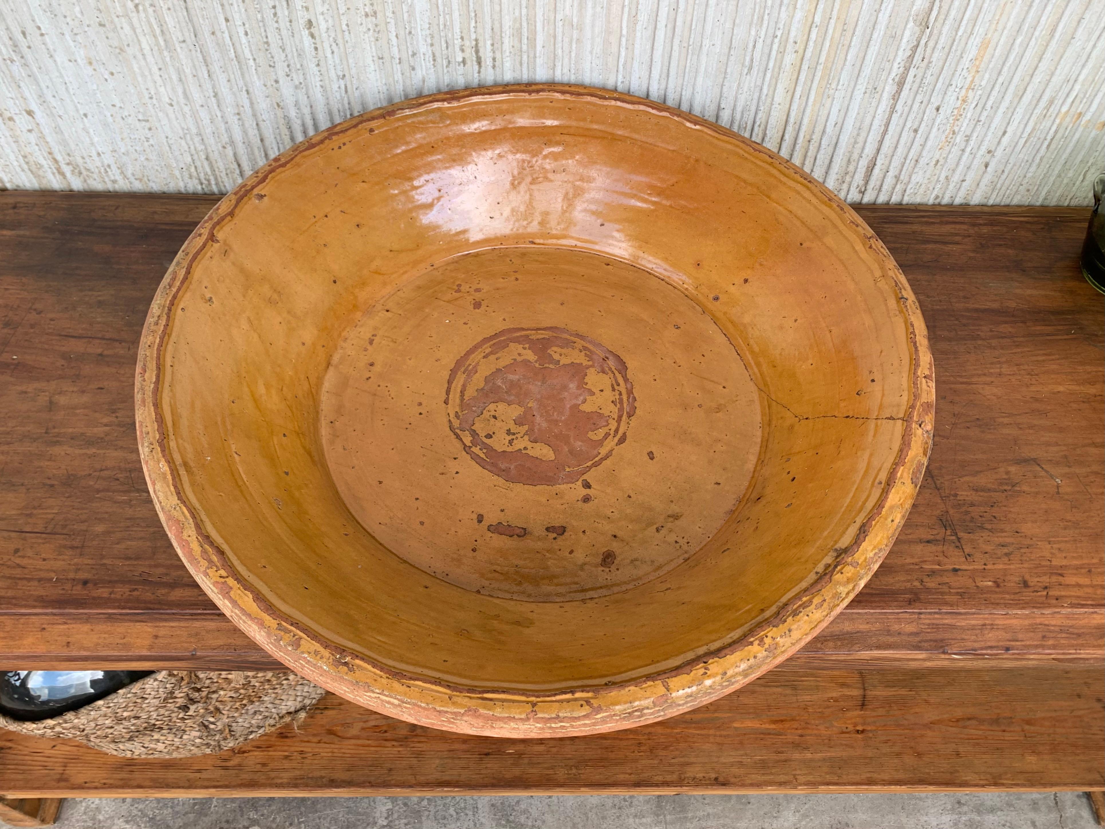 Large one-of-a-kind gorgeous hand thrown and hand glazed cream brown colored stoneware pottery bowl vessel. Thick and glazing like.

This would make an excellent indoor or outdoor water feature. Also appropriate for indoor or outdoor use for