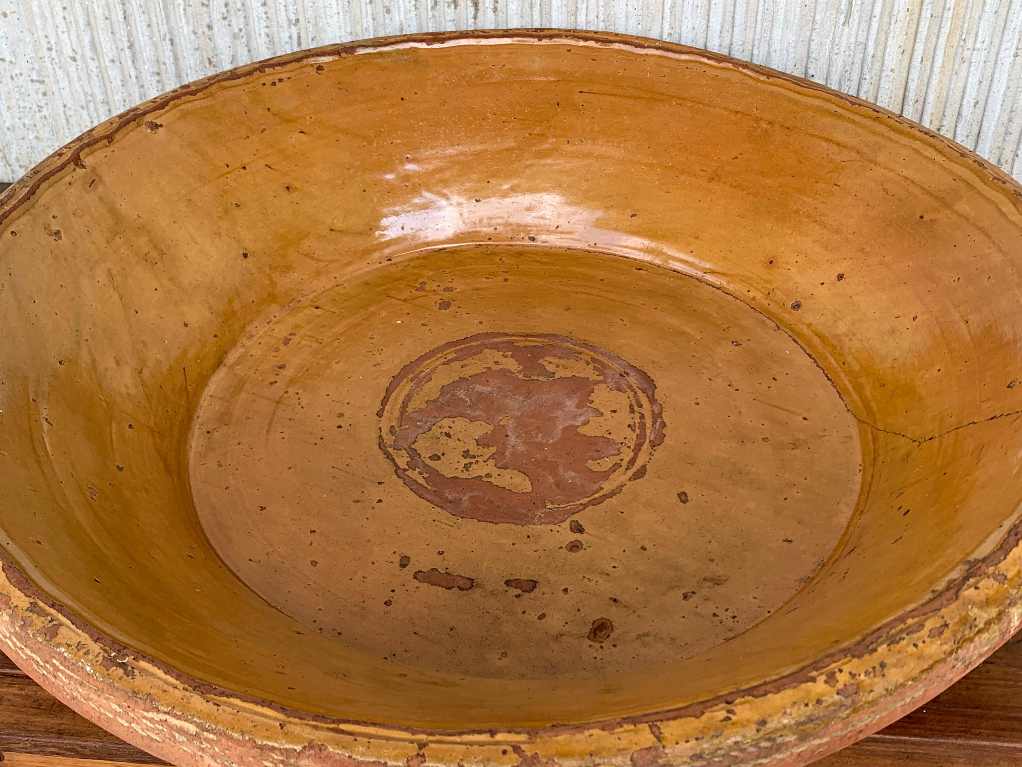 Clay 19th Century Spanish Hand Thrown and Glazed Mustard Brown Stoneware Pottery Bowl For Sale