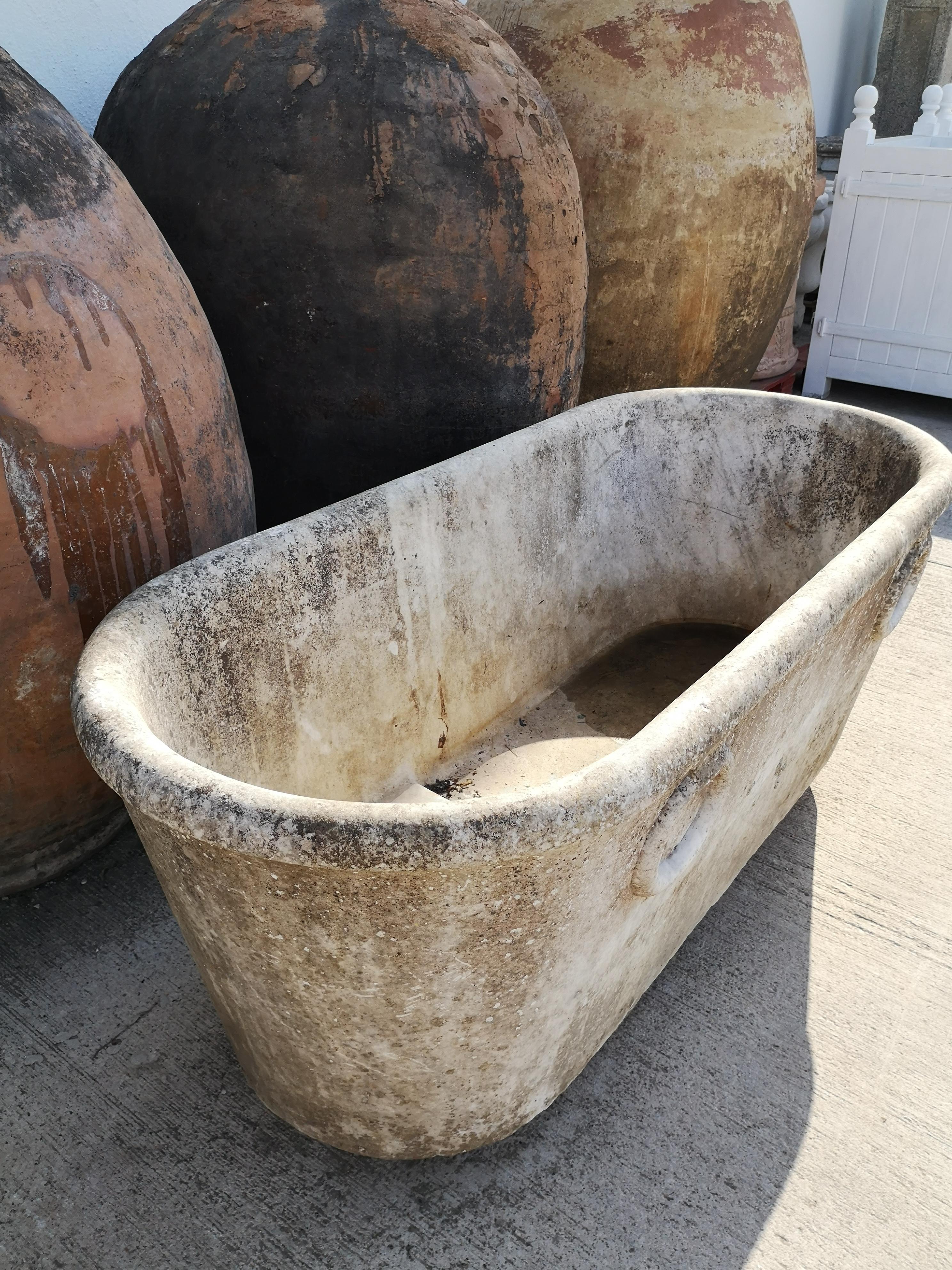 Antique 19th century Spanish handcarved marble bath with rings.