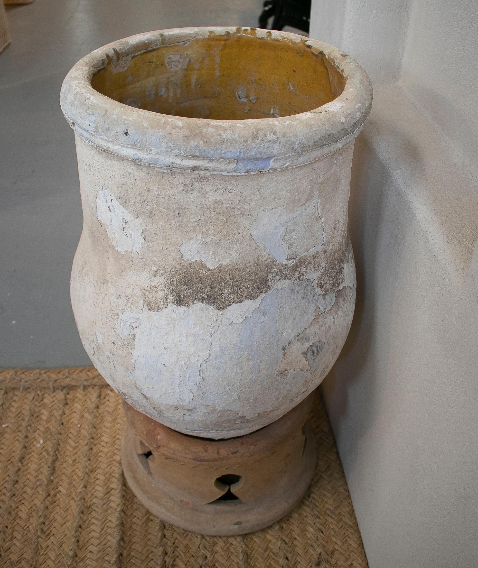 19th century Spanish handmade large whitewashed terracotta vase jar. 

Pedestal base not included in price.