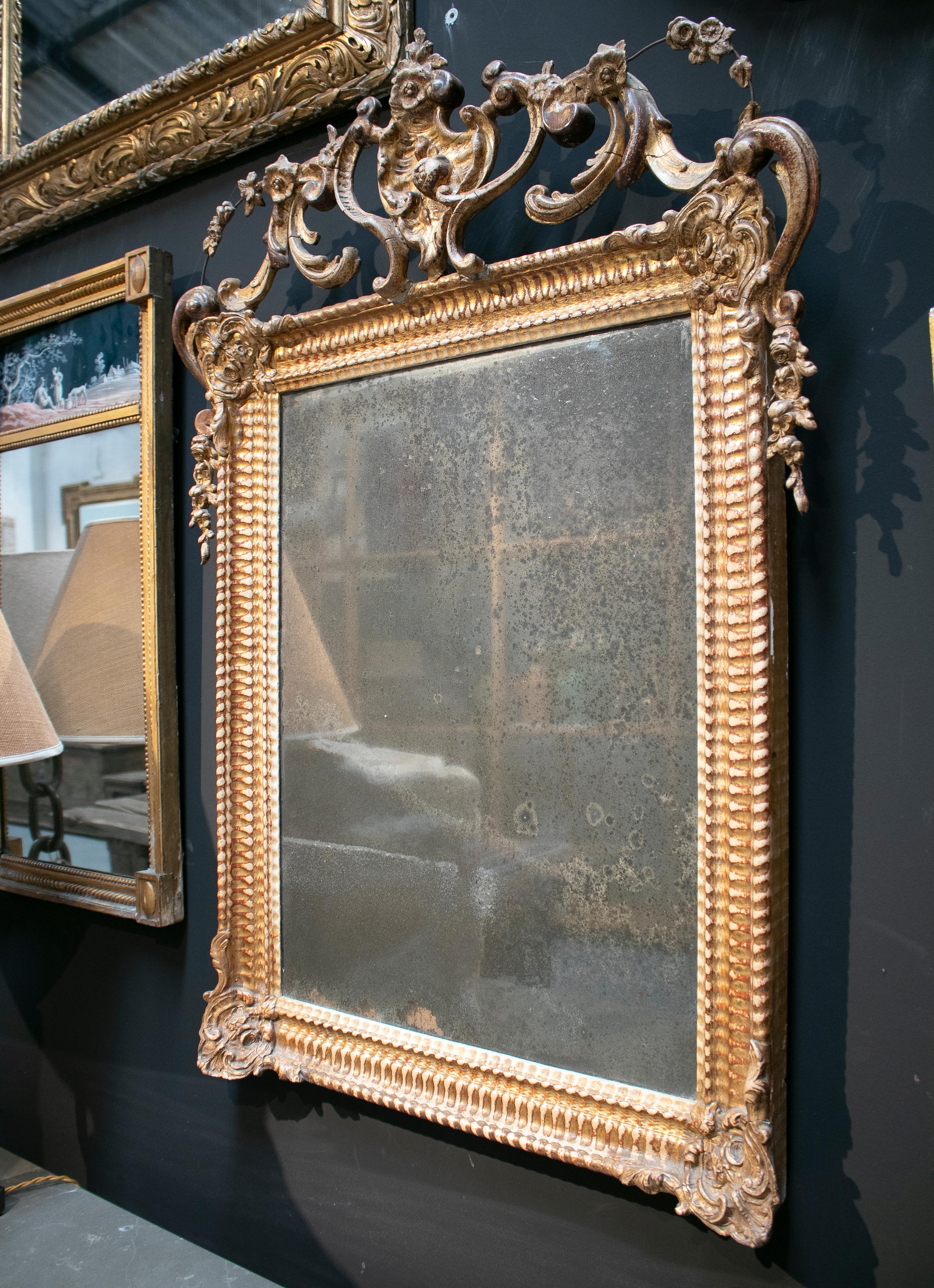 19th century Spanish Isabellin rococo golden mirror.
