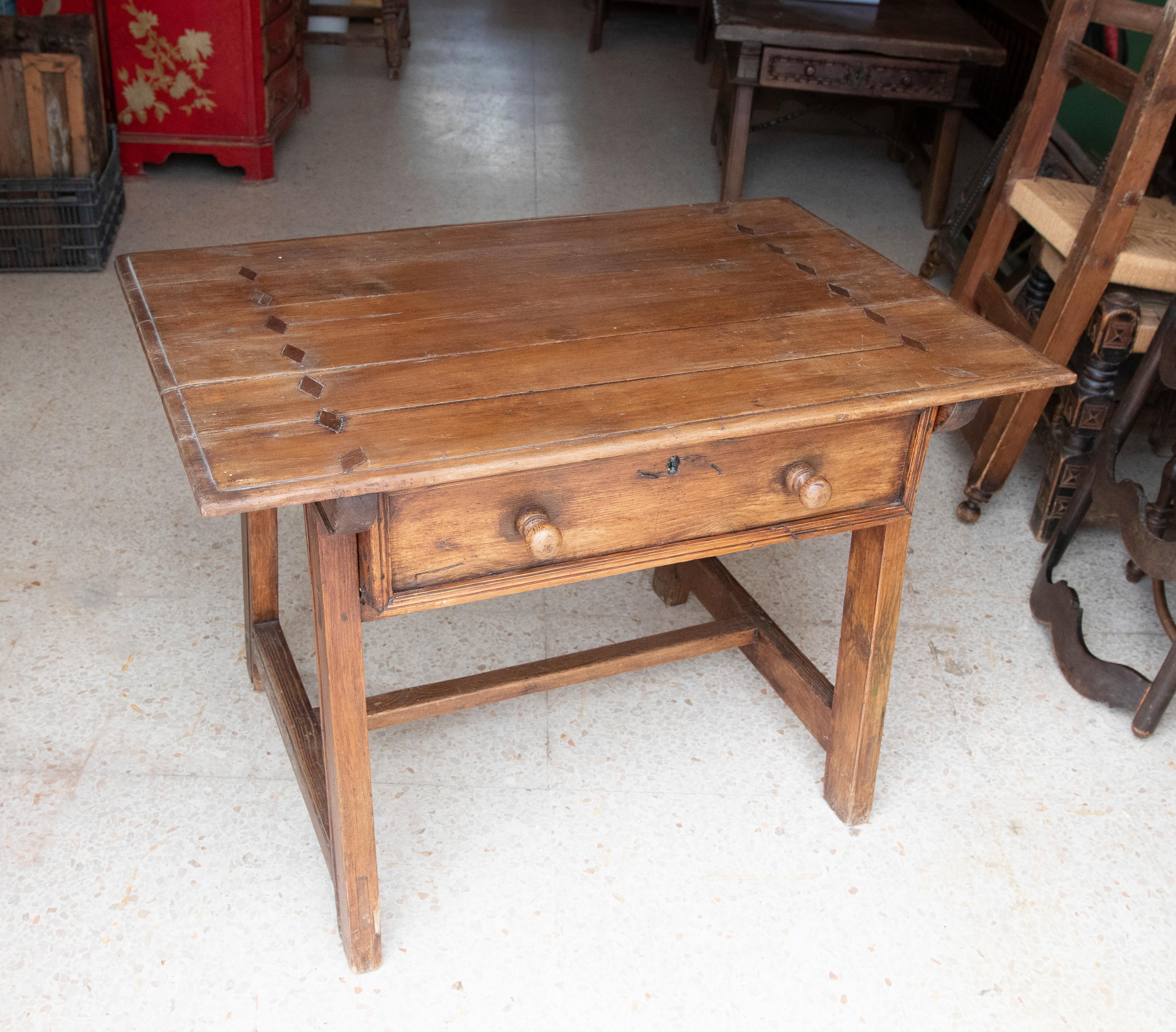 19th Century Spanish kitchen work table with drawer and iron decorations.