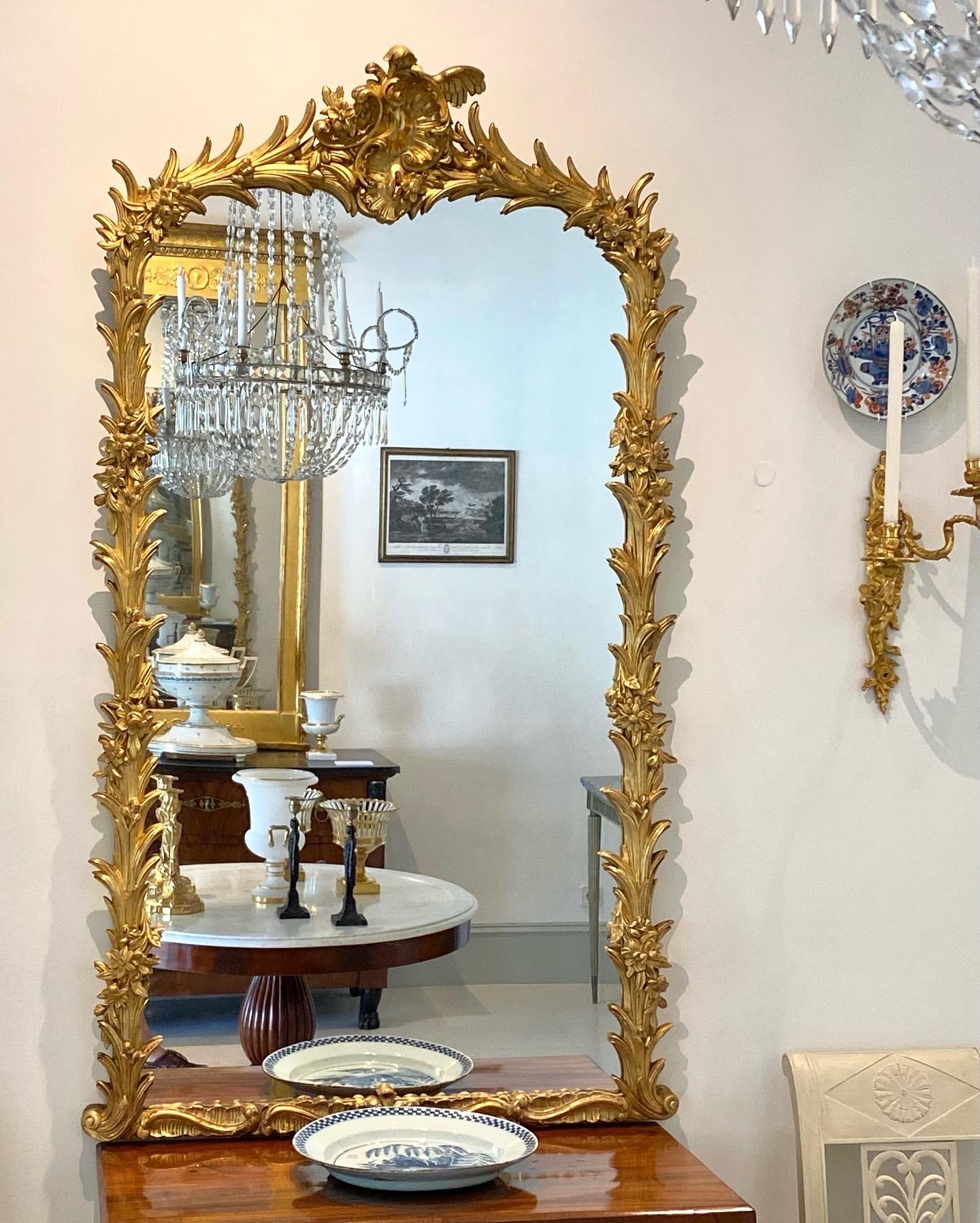 Spanish neo rococo mirror after original 18th century models design by the famous Italian architects Sempronio Subissati and Giovanni Battista Sachetti for the Royal Palace of La Granja in Segovia, Spain.
The mirror was made in the middle of the