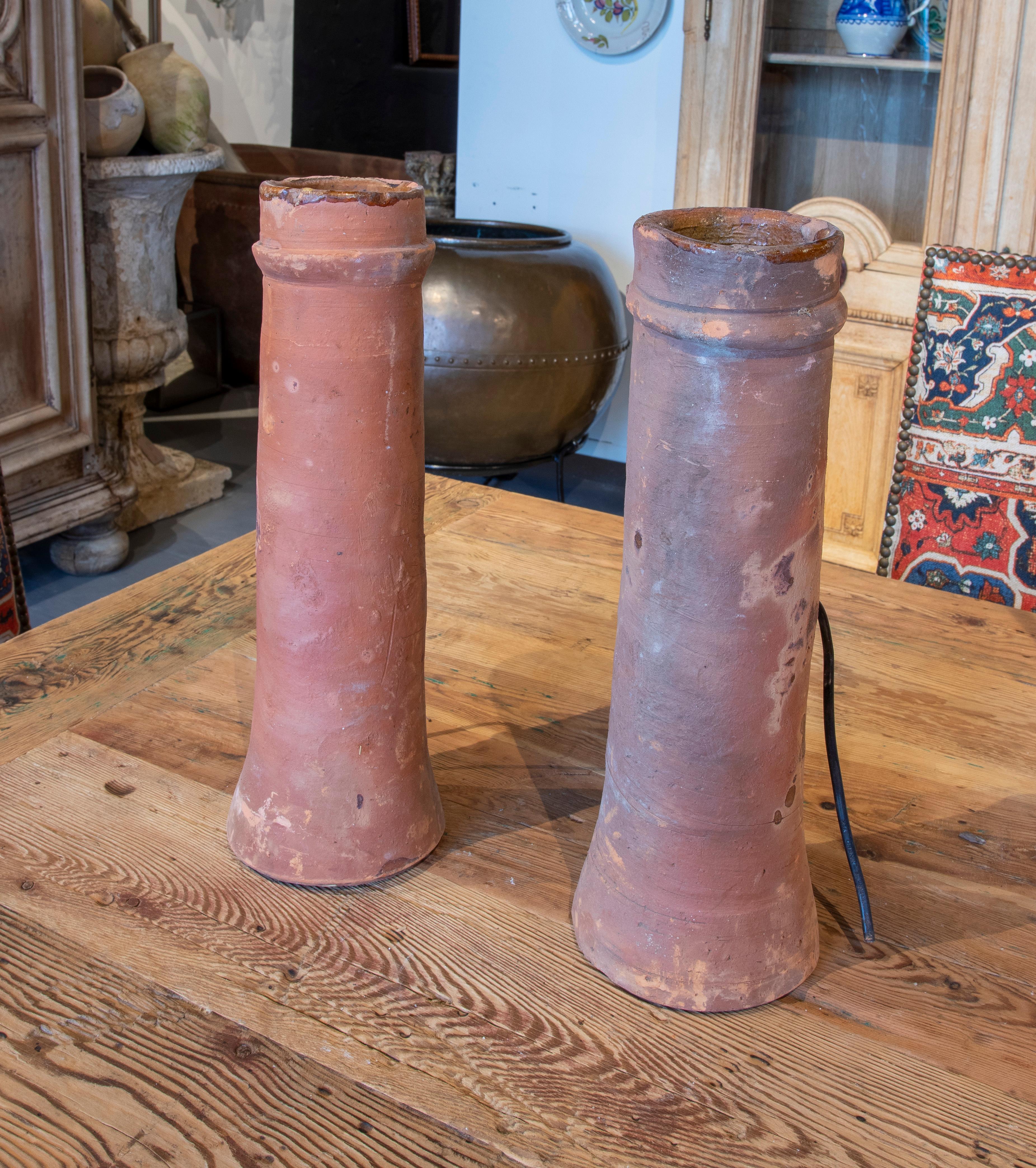 19th Century Spanish pair of wall lights made with ceramic gutters.