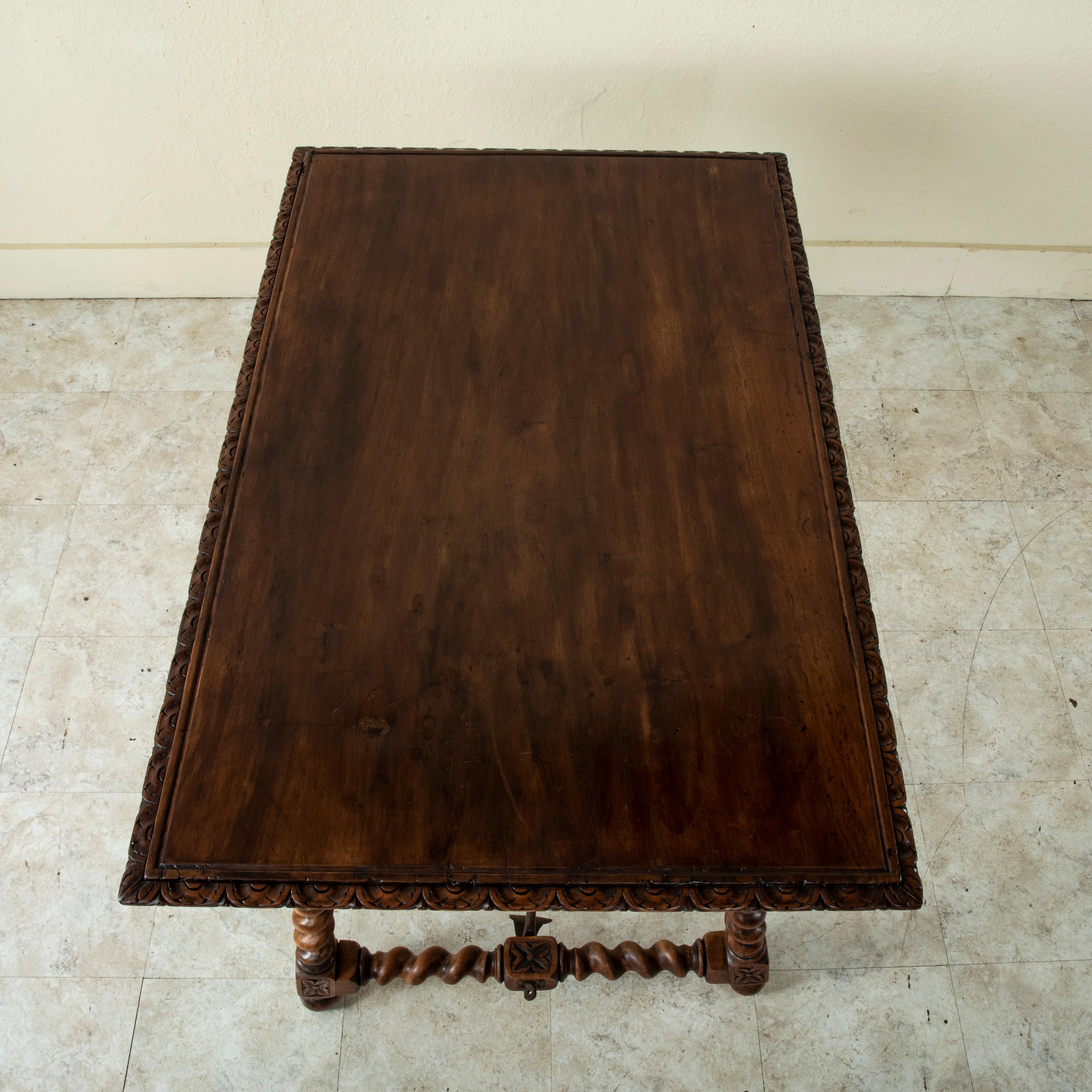 19th Century Spanish Renaissance Style Walnut Table with Forged Iron Stretcher In Good Condition For Sale In Fayetteville, AR