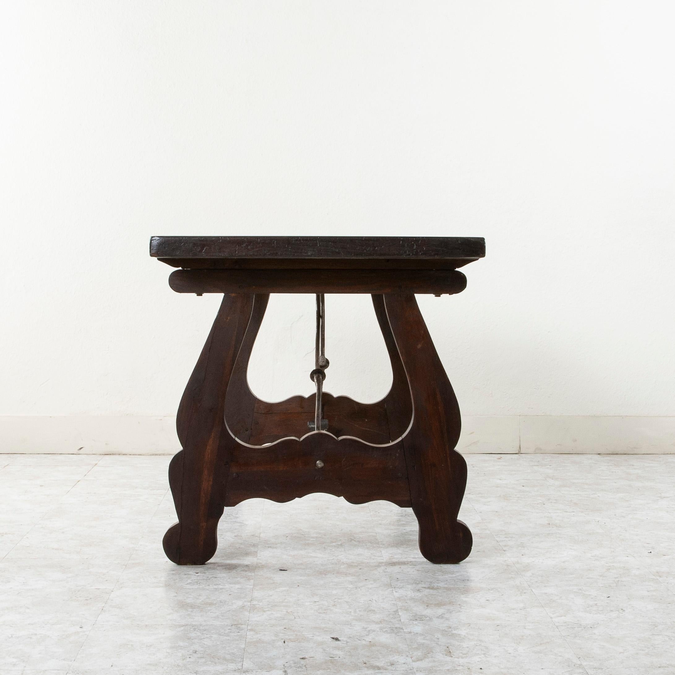 French 19th Century Spanish Renaissance Style Walnut Writing Table with Iron Stretcher For Sale