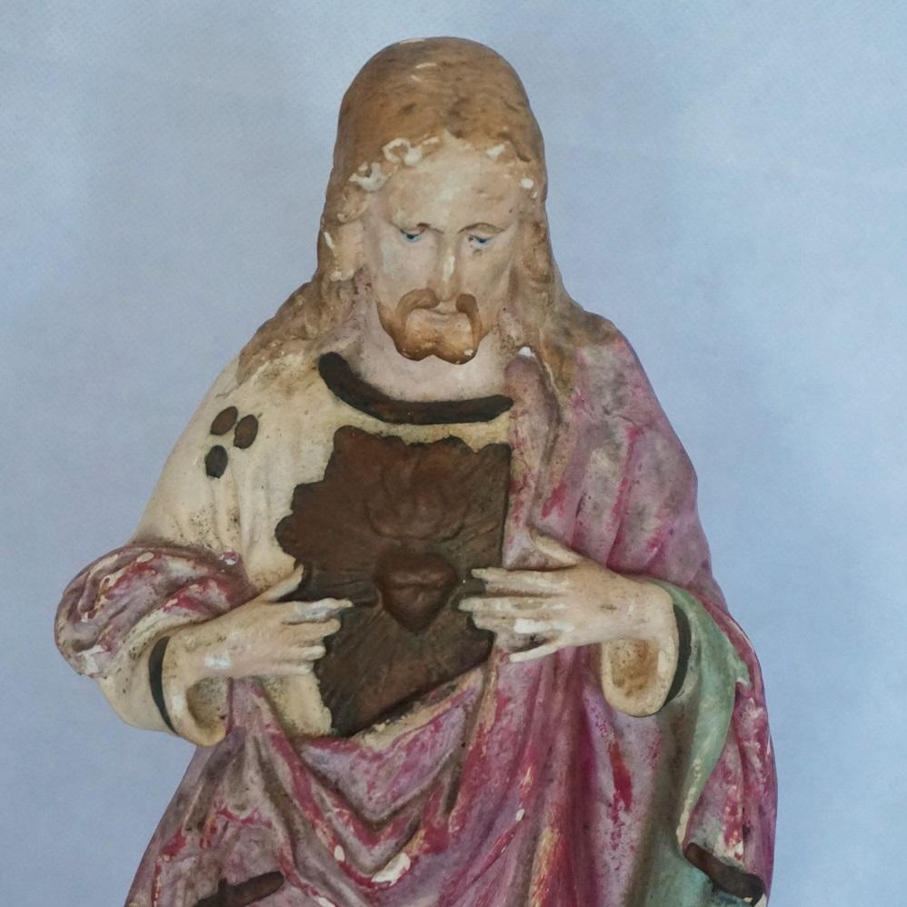 Beautiful antique handmade Sacred Heart Of Jesus sculpture, plaster and polychrome painted, Spain, mid 19th century. 
Size: 16.50 inches tall (42 cm)
Condition: The statue is in good antique condition, some small color losses, for details please see