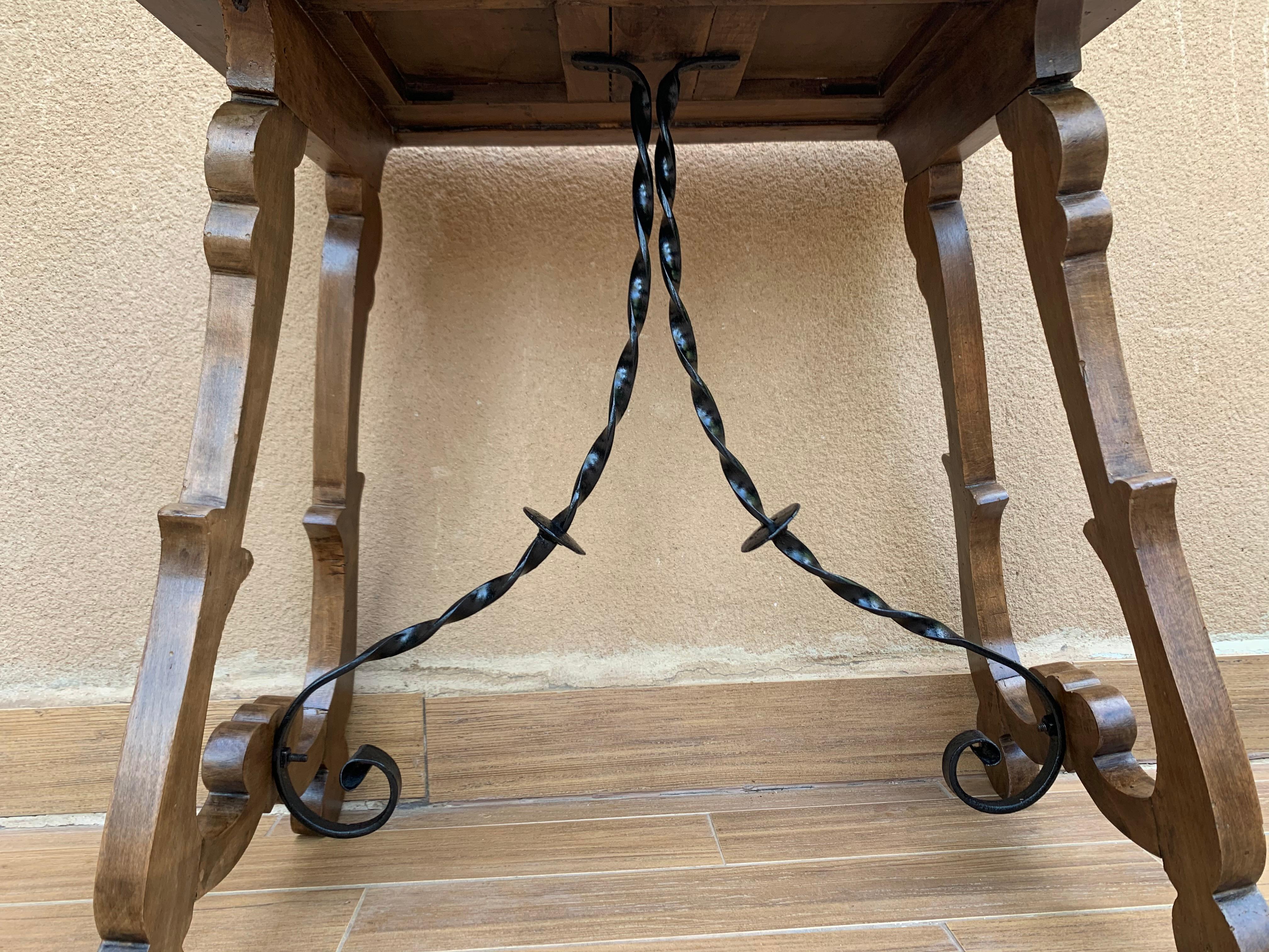 Baroque 19th Century Spanish Side Table with Hand Carved Lyre Leg and Iron Stretcher