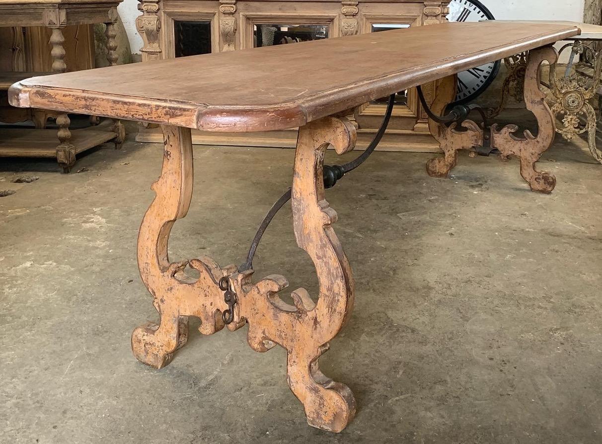 A beautiful large 19th century Spanish dinning table with lovely original paint. It has a beautiful hand forged iron support which is typical of Spanish tables. In great original condition ready to use.