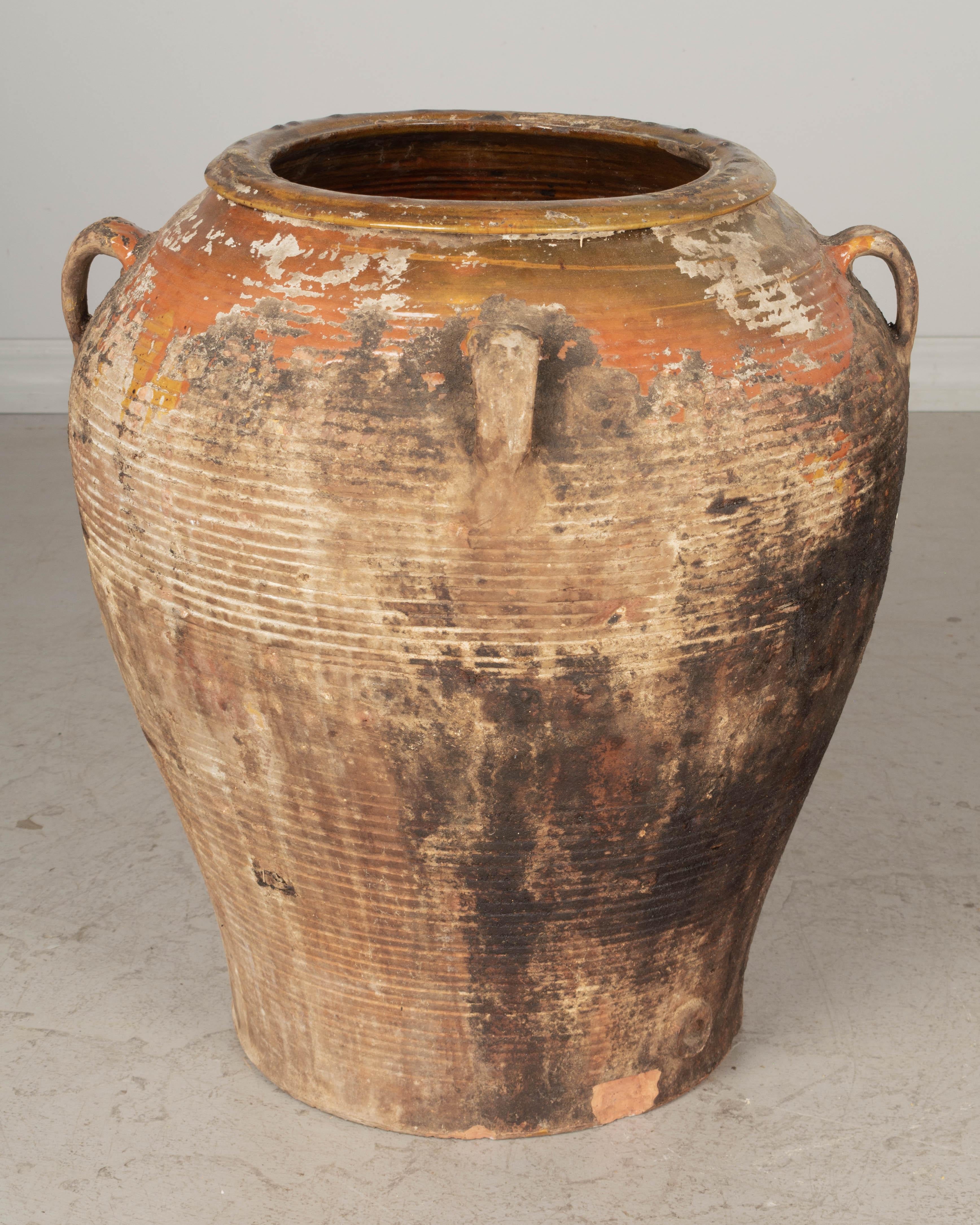 Hand-Crafted 19th Century Spanish Terracotta Olive Jar For Sale