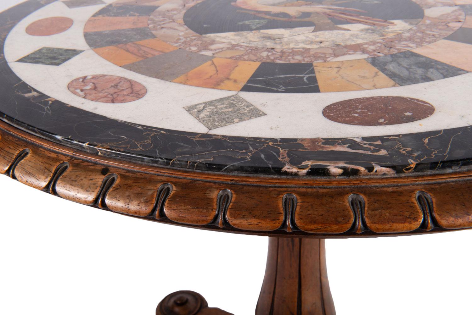 A fine quality 19th century Maltese specimen inlaid marble-top table including portoro, verde antico, giallo di Siena and cipolino, the centre having a Pietro dura panel depicting an exotic parrot on a branch, set into a Mahogany circular top with