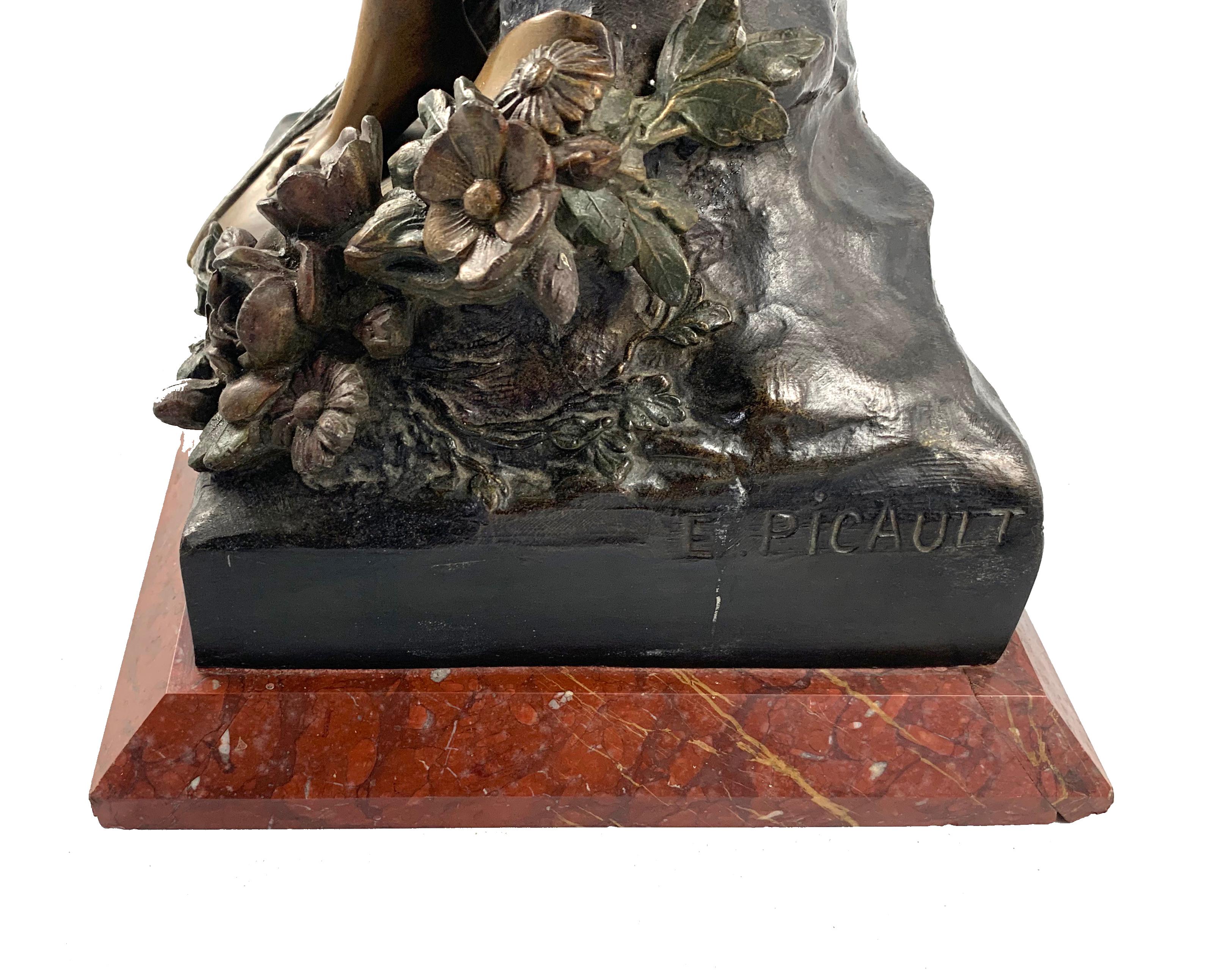An impressive French spelter figure of Victory, circa 1900. In mid and gilt brown patination. Inscribed on the base 
