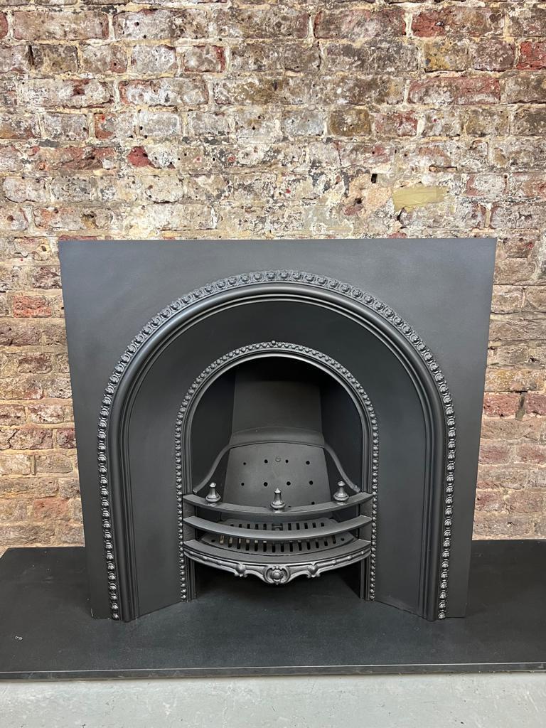 Victorian 19th Century Spiked Cast Iron Arched Fireplace Insert For Sale