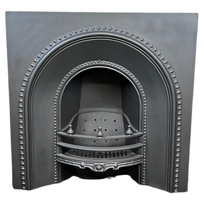 19th Century Spiked Cast Iron Arched Fireplace Insert For Sale