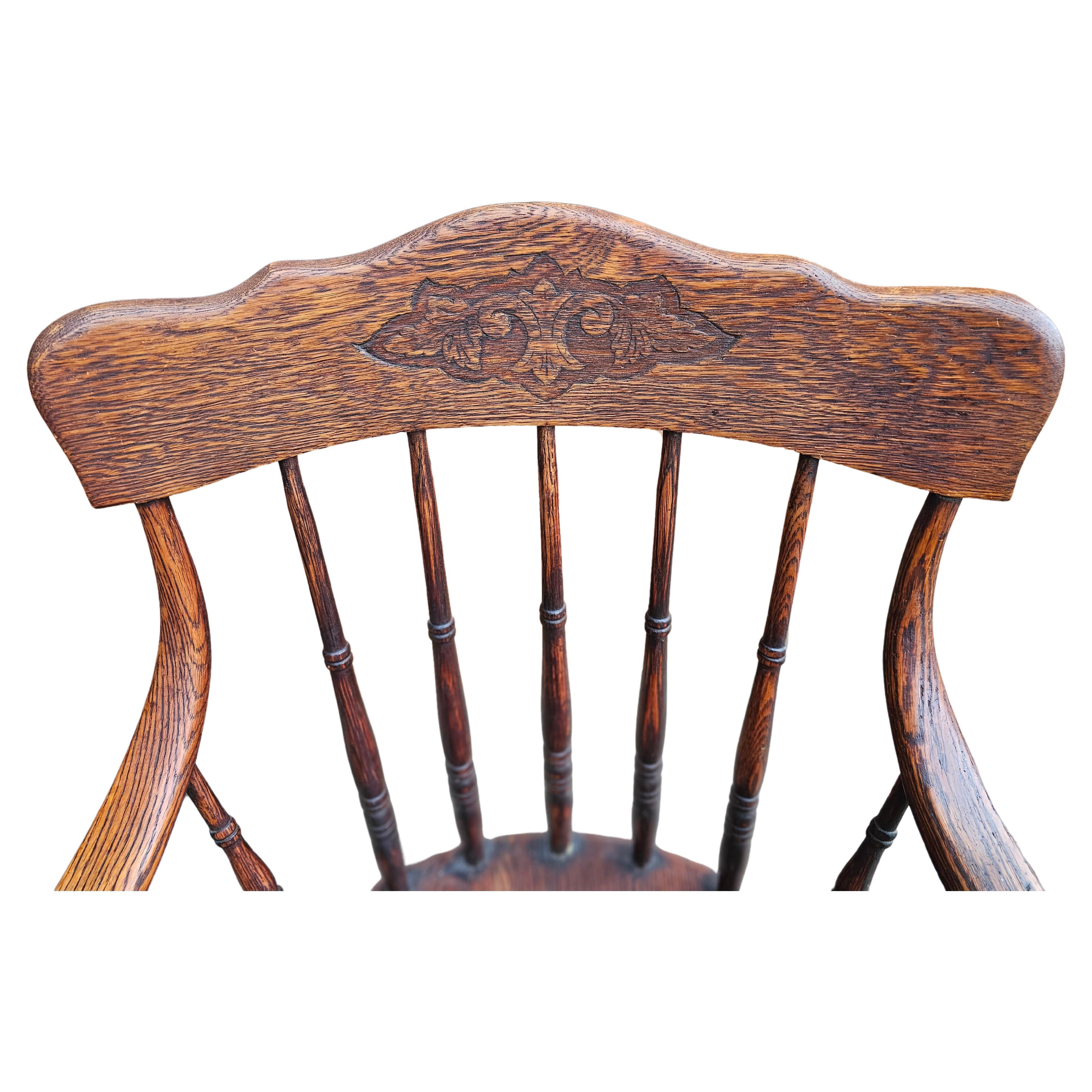 American 19th Century Spindle Oak Windsor Continuous Arm Chair For Sale
