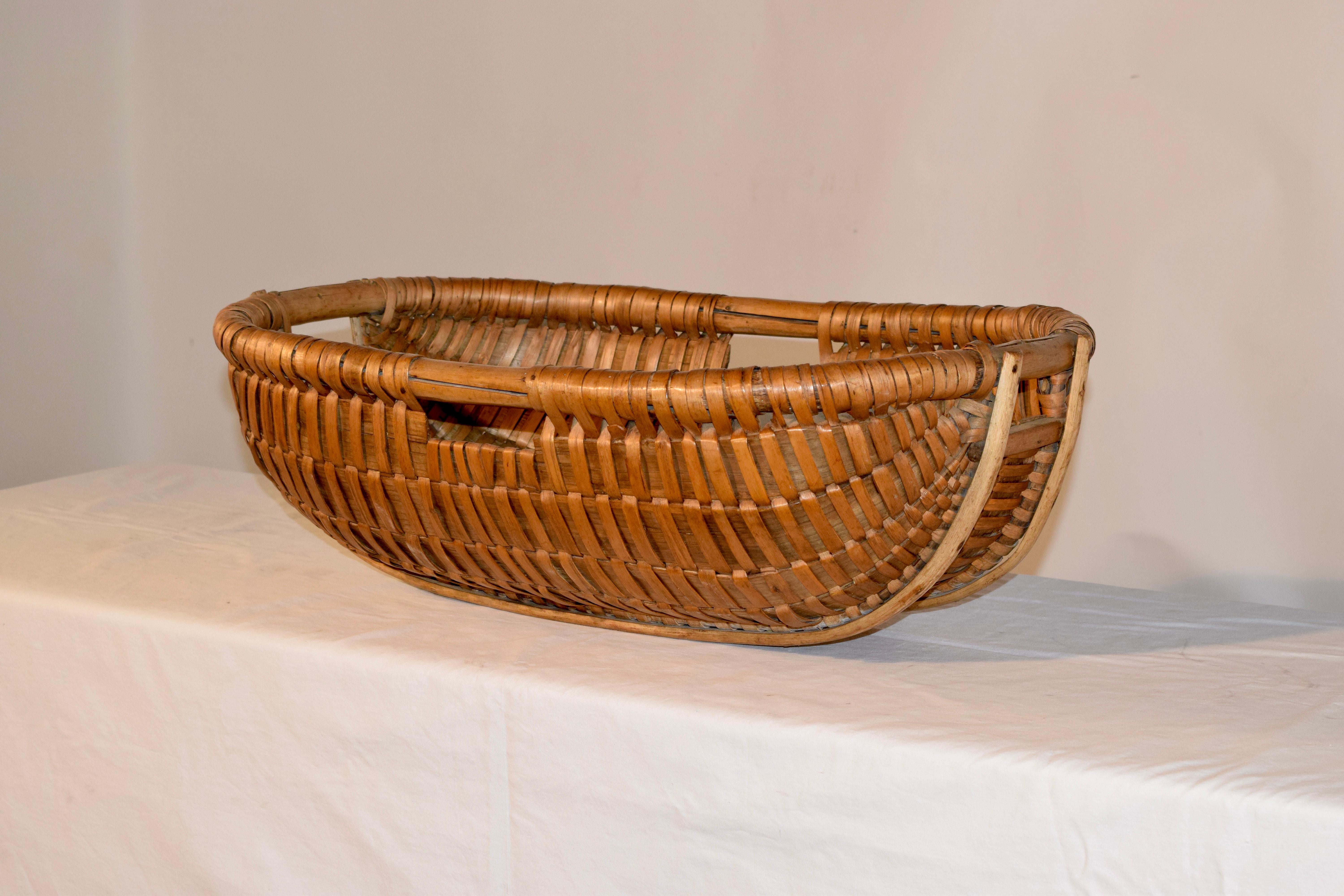 19th century split oak handwoven basket from France. Lovely shape and size.