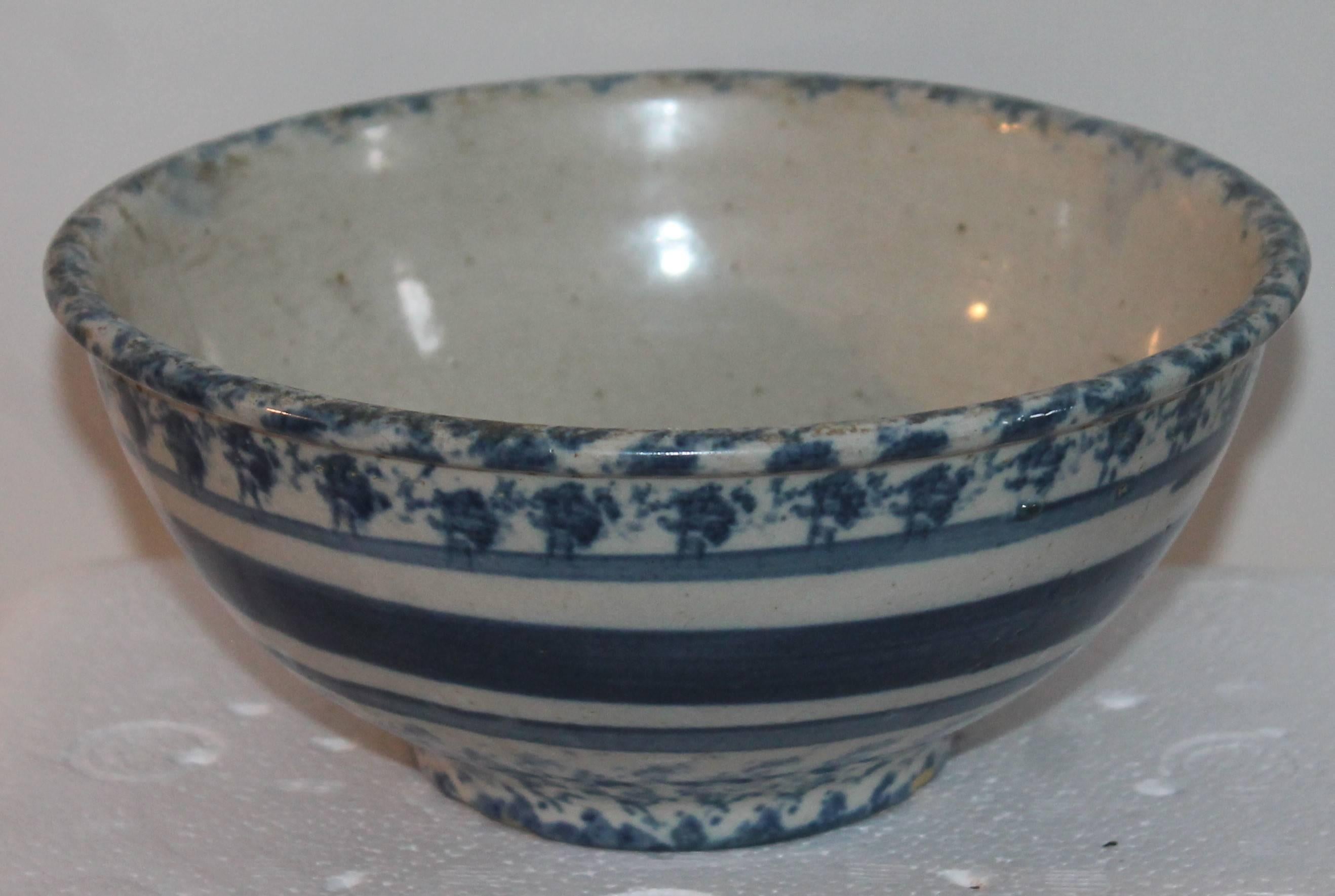 19th century sponge ware bowl. Beautiful stripes and pattern on this bowl show age of wear consistent with age and use. Shows some dings but in great usable condition.