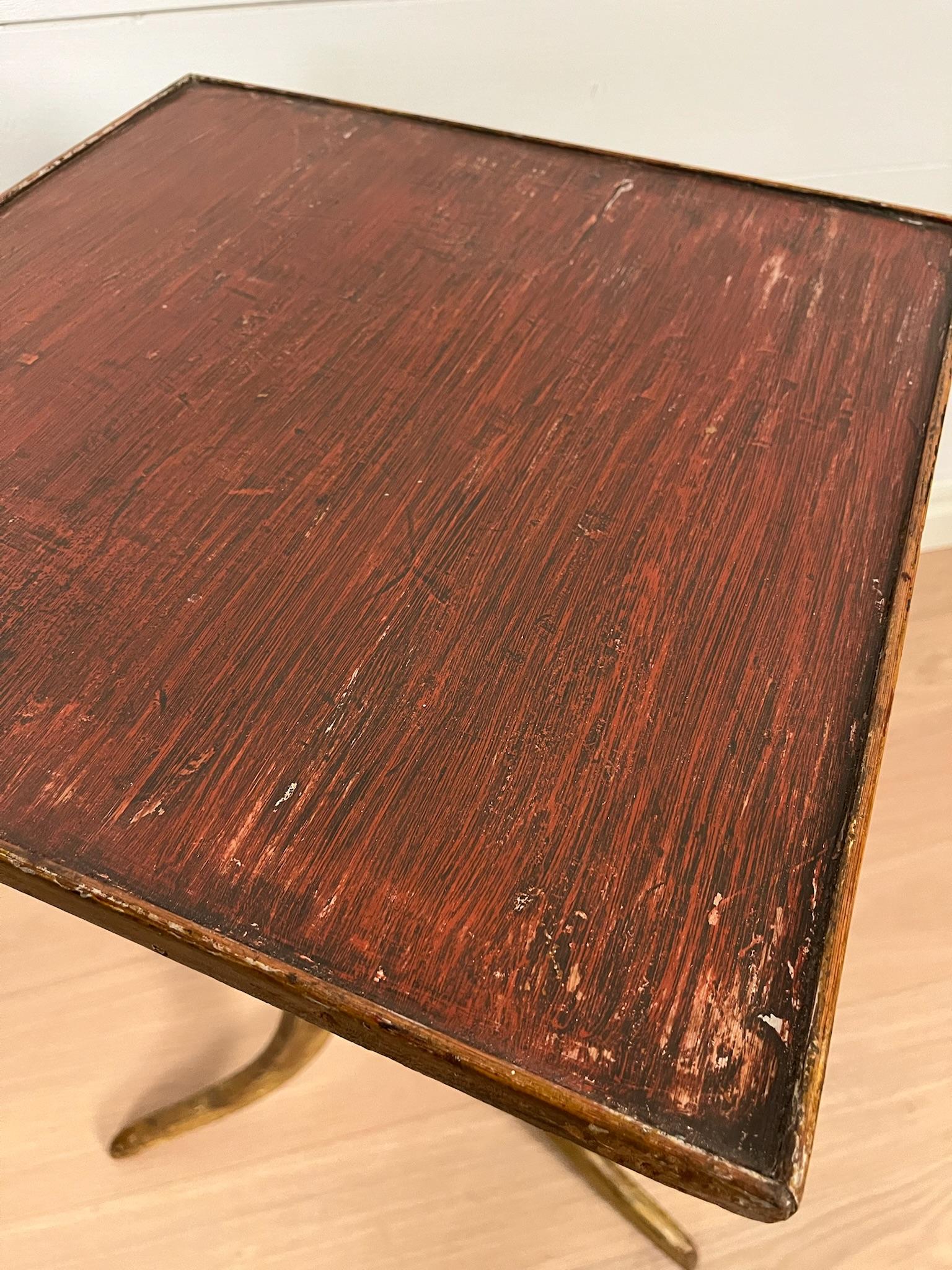 Antique square folding table handcrafted in Sweden in the 19th century
Original-painted top 
Later wooden plug 

Beautiful detail to any home