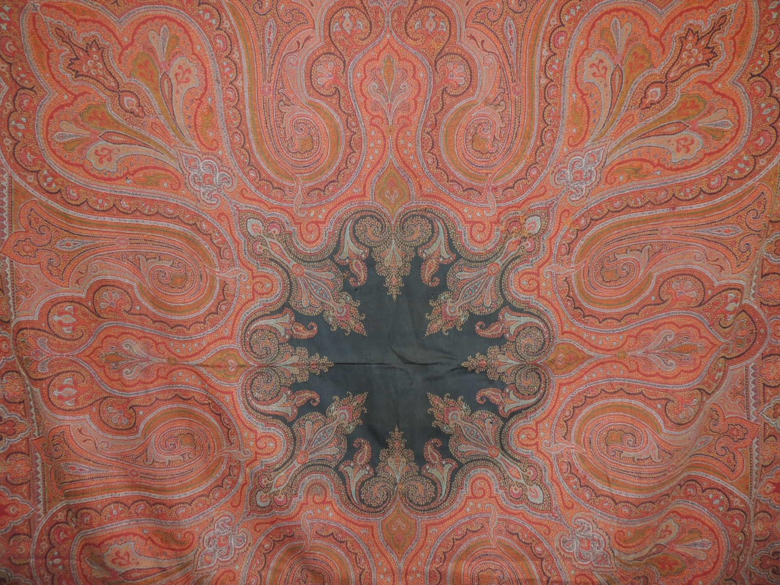 Large Kashmir embroidered paisley coverlet, throw, cloth or shawl with dark wool and backing, boteh border all around. Needlework technique known as Rafugar;
Separately woven and joined to the field, center medallion in dark wool. Predominately in