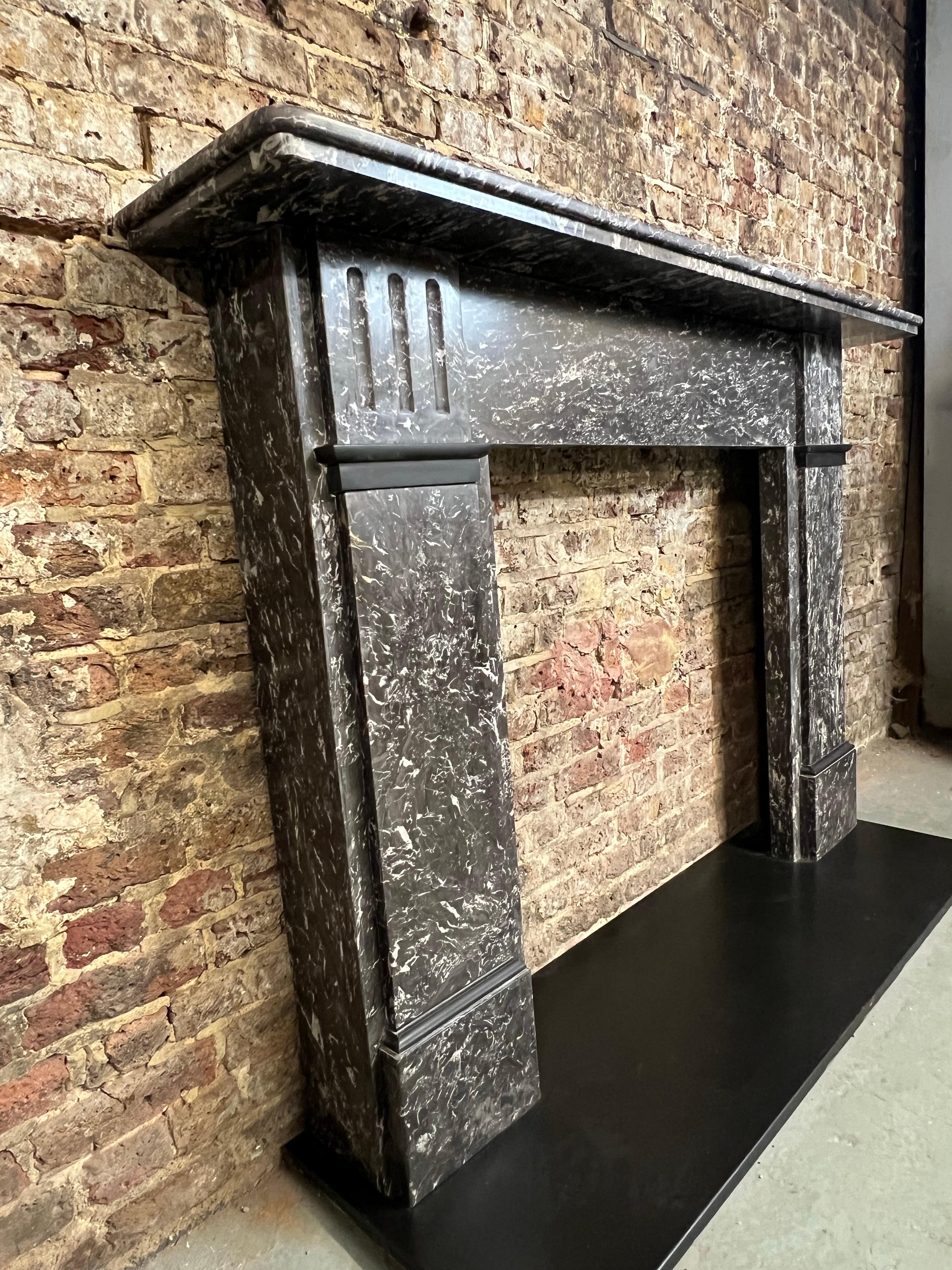 Hand-Carved 19th Century St. Annes Marble Fireplace Mantelpiece For Sale