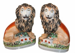 Pair of 19th Century Staffordshire Lions/Lambs