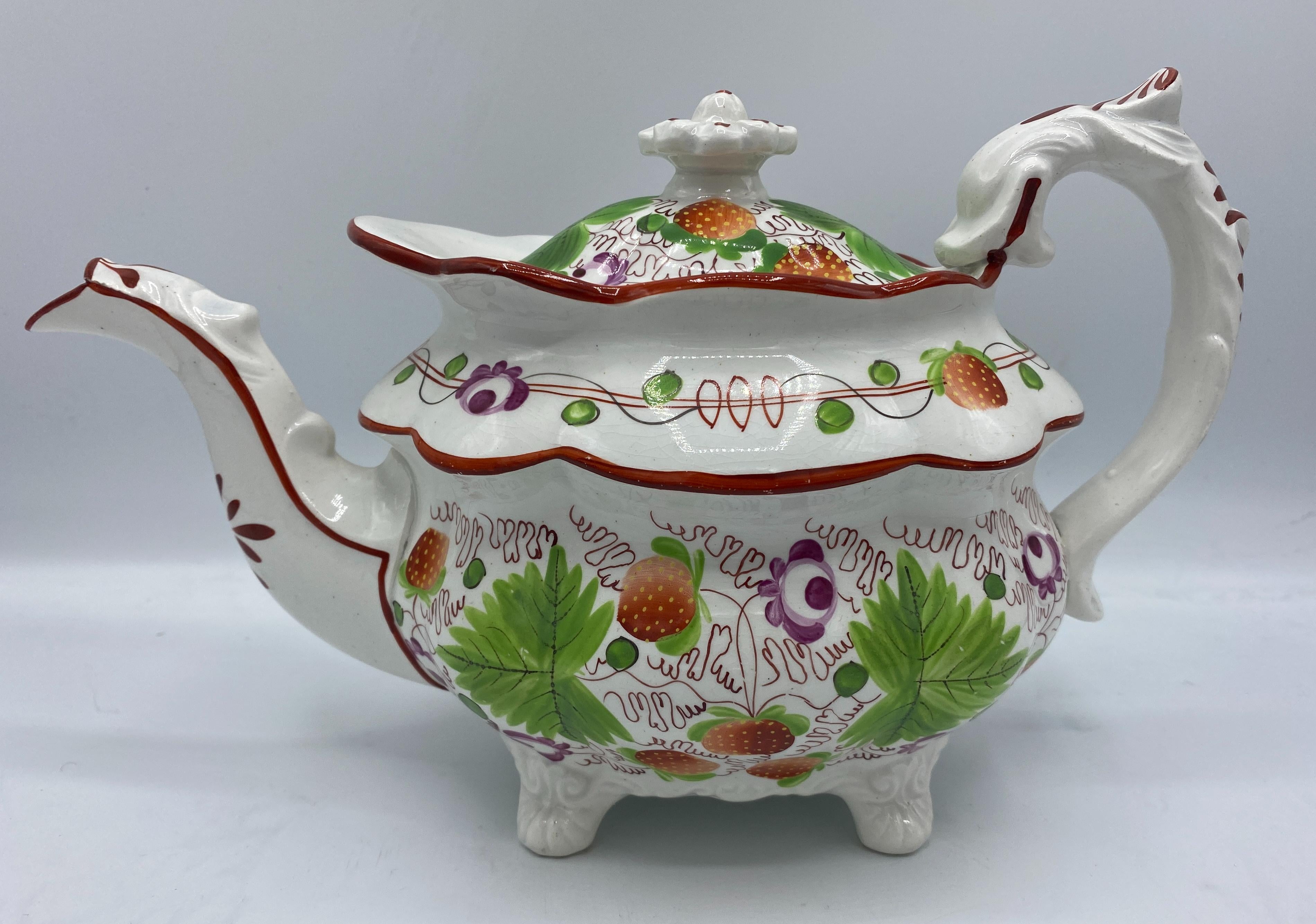 19th century Staffordshire Pealware tea set with strawberry pattern with vines and green leaves. England, 1830 circa
Measurements: 
Teapot - 7.5